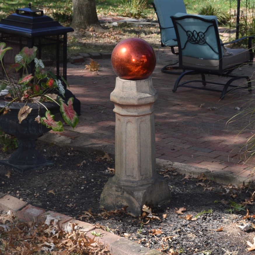 Clay Chimney Cap with Red Gazing Ball