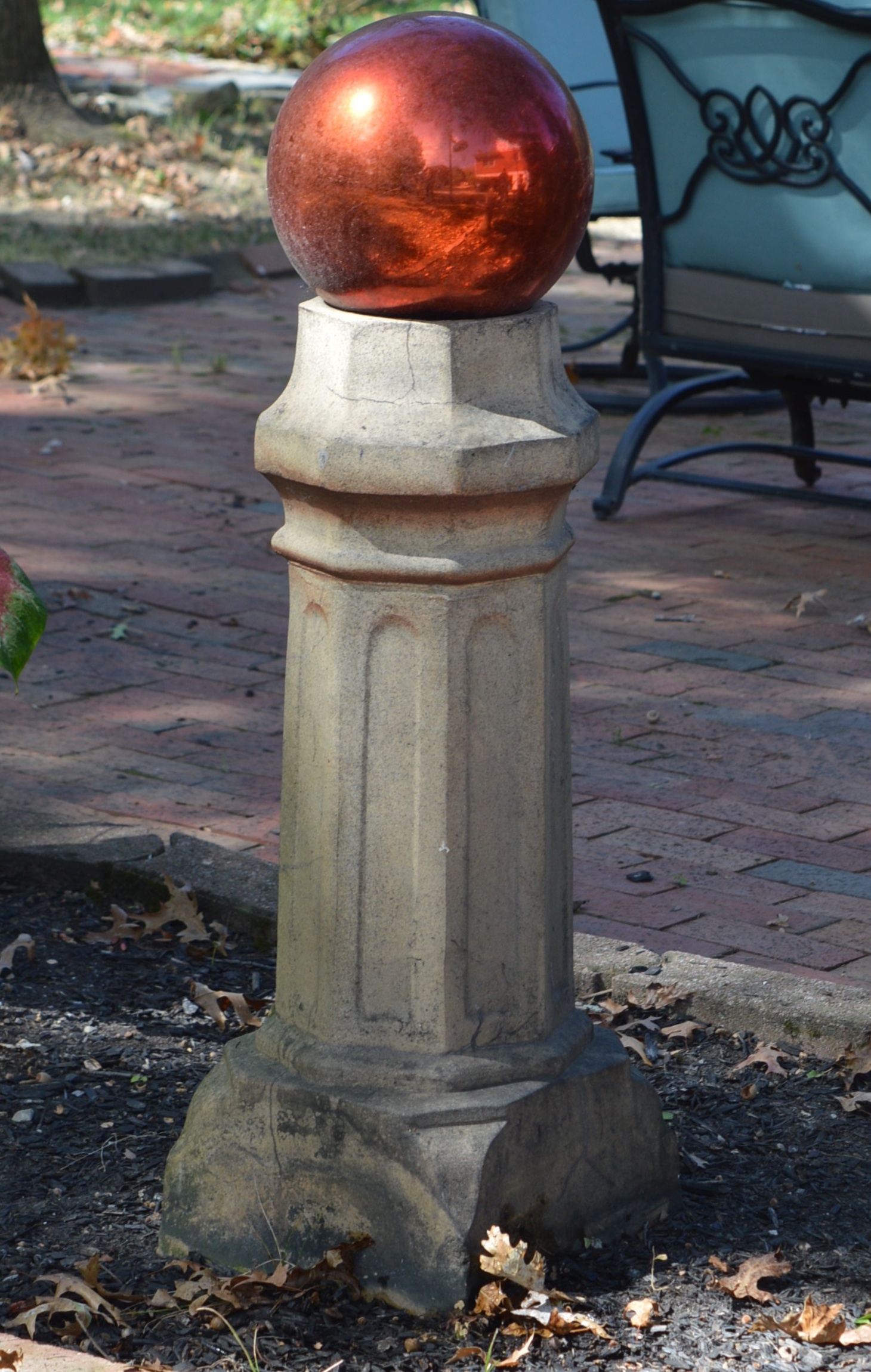 Clay Chimney Cap with Red Gazing Ball
