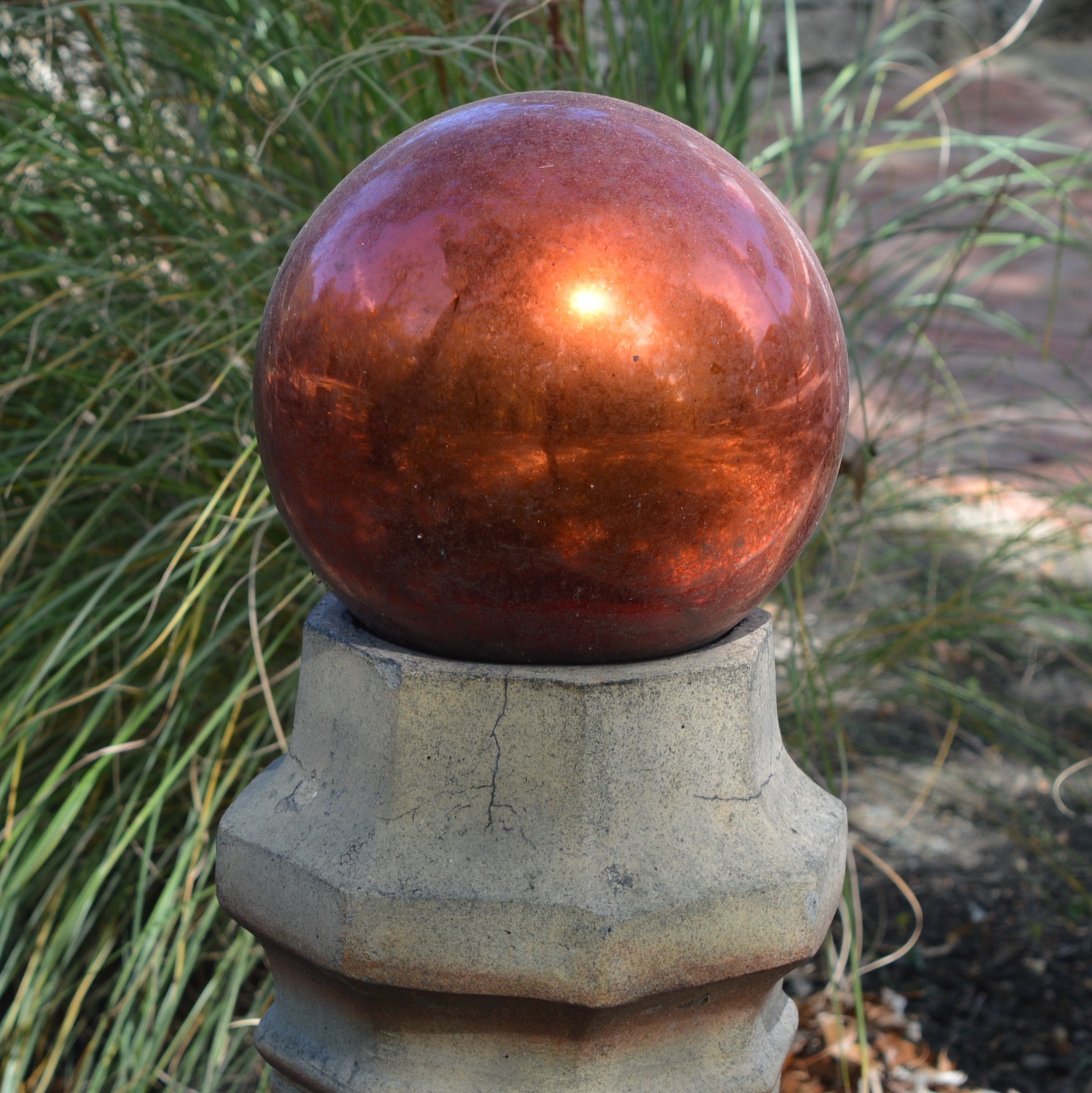 Clay Chimney Cap with Red Gazing Ball