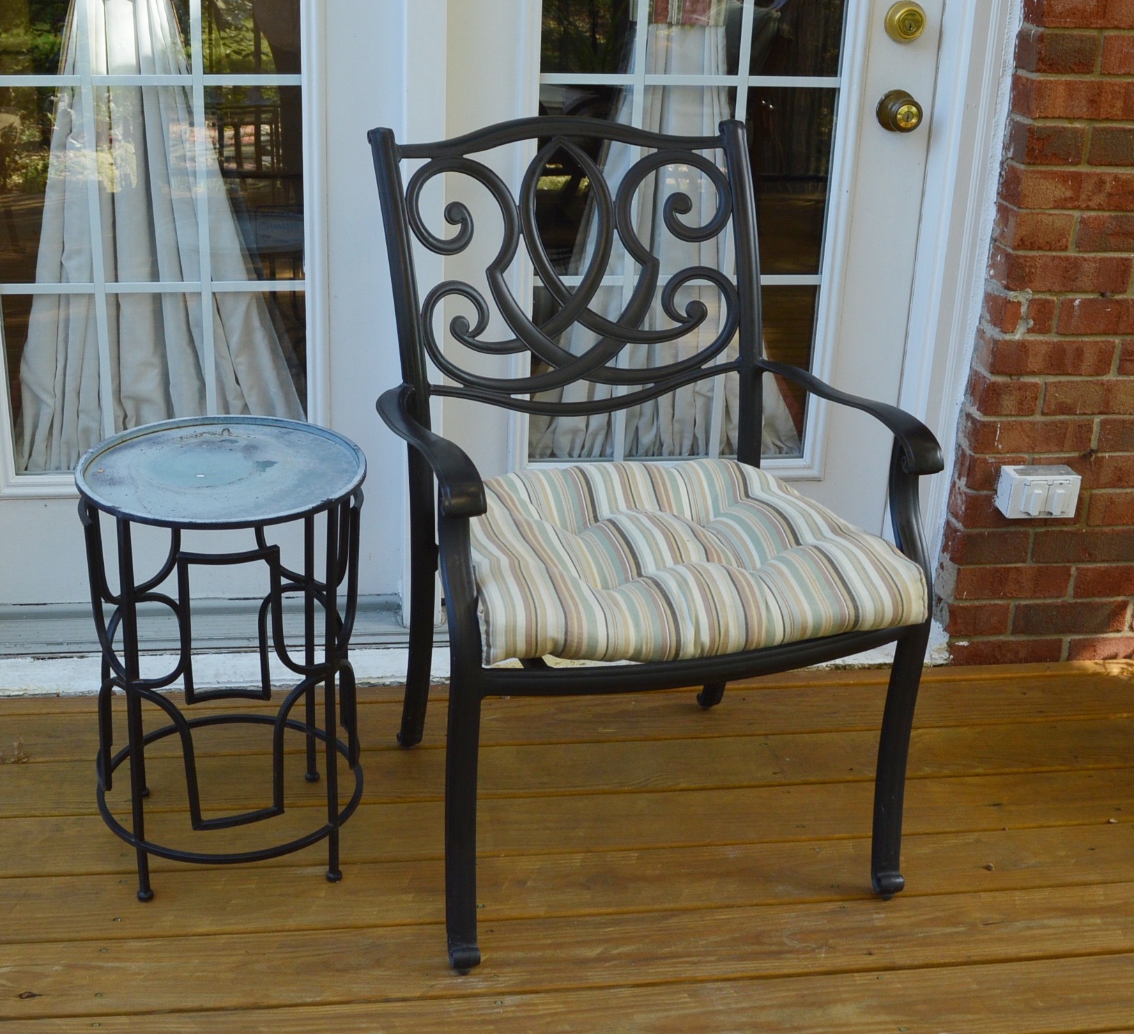 Three Patio Chairs and Two Tables