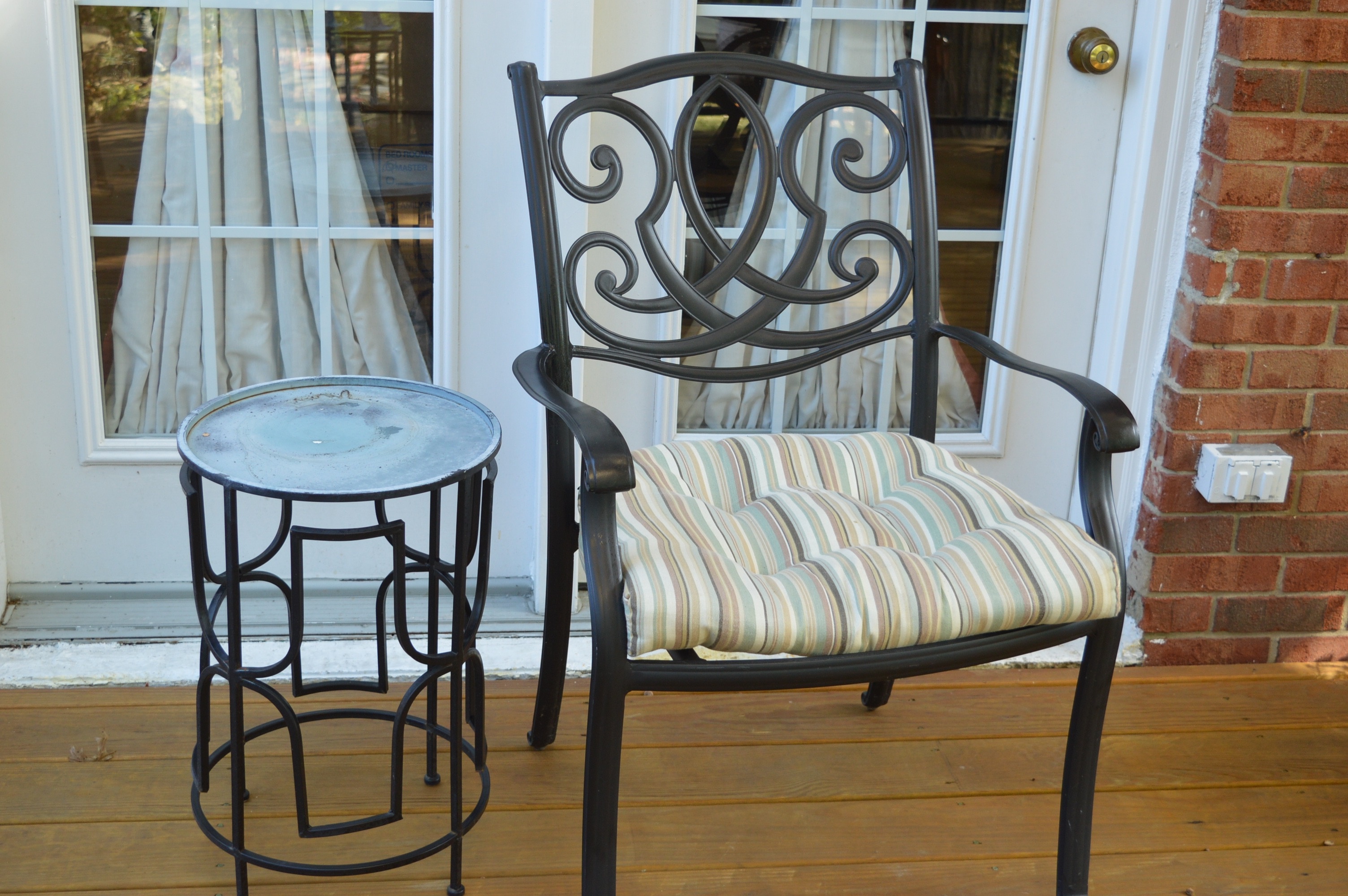 Three Patio Chairs and Two Tables