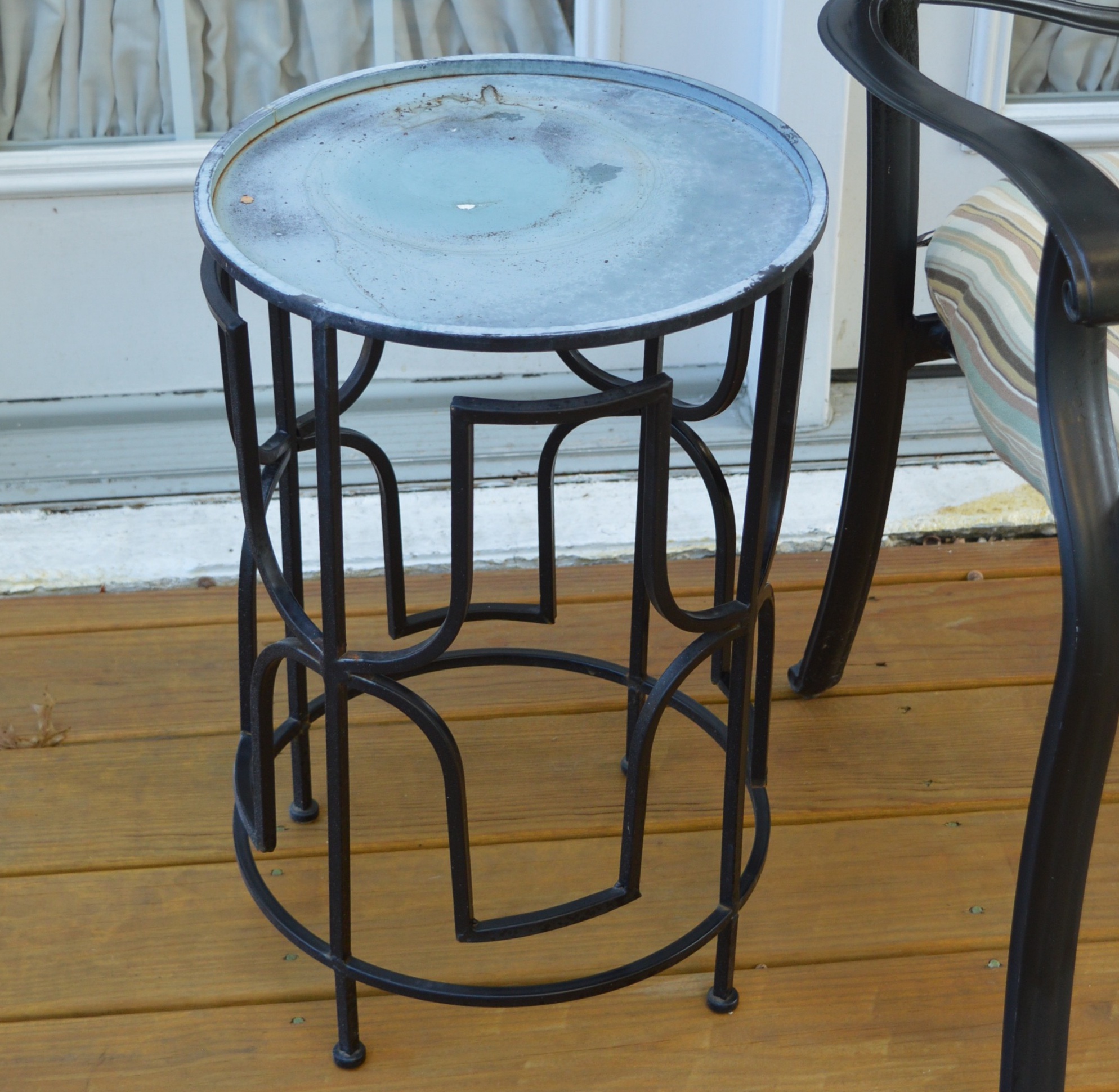 Three Patio Chairs and Two Tables