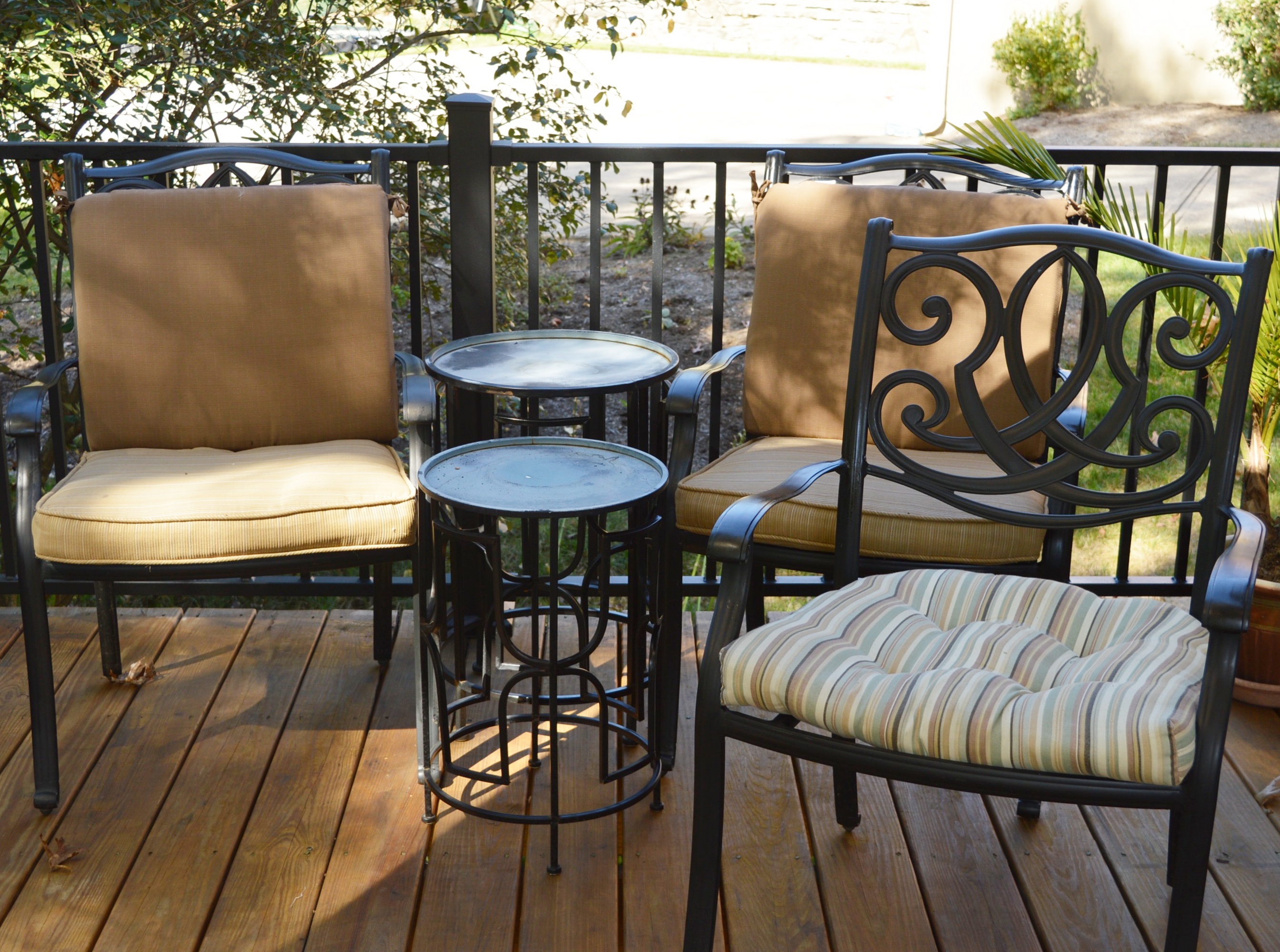 Three Patio Chairs and Two Tables