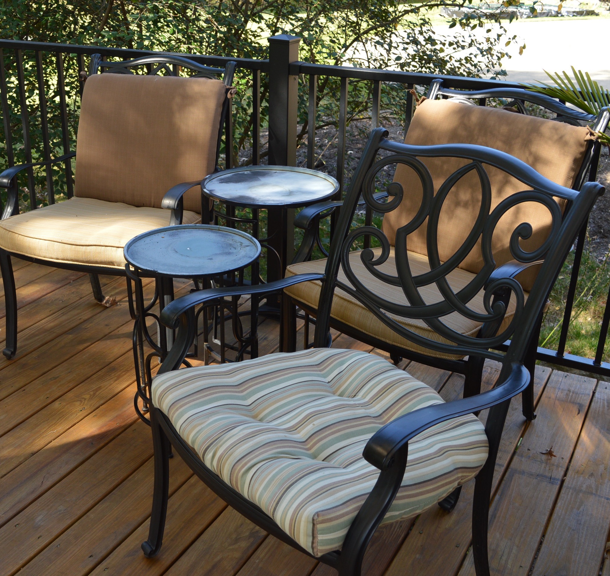 Three Patio Chairs and Two Tables