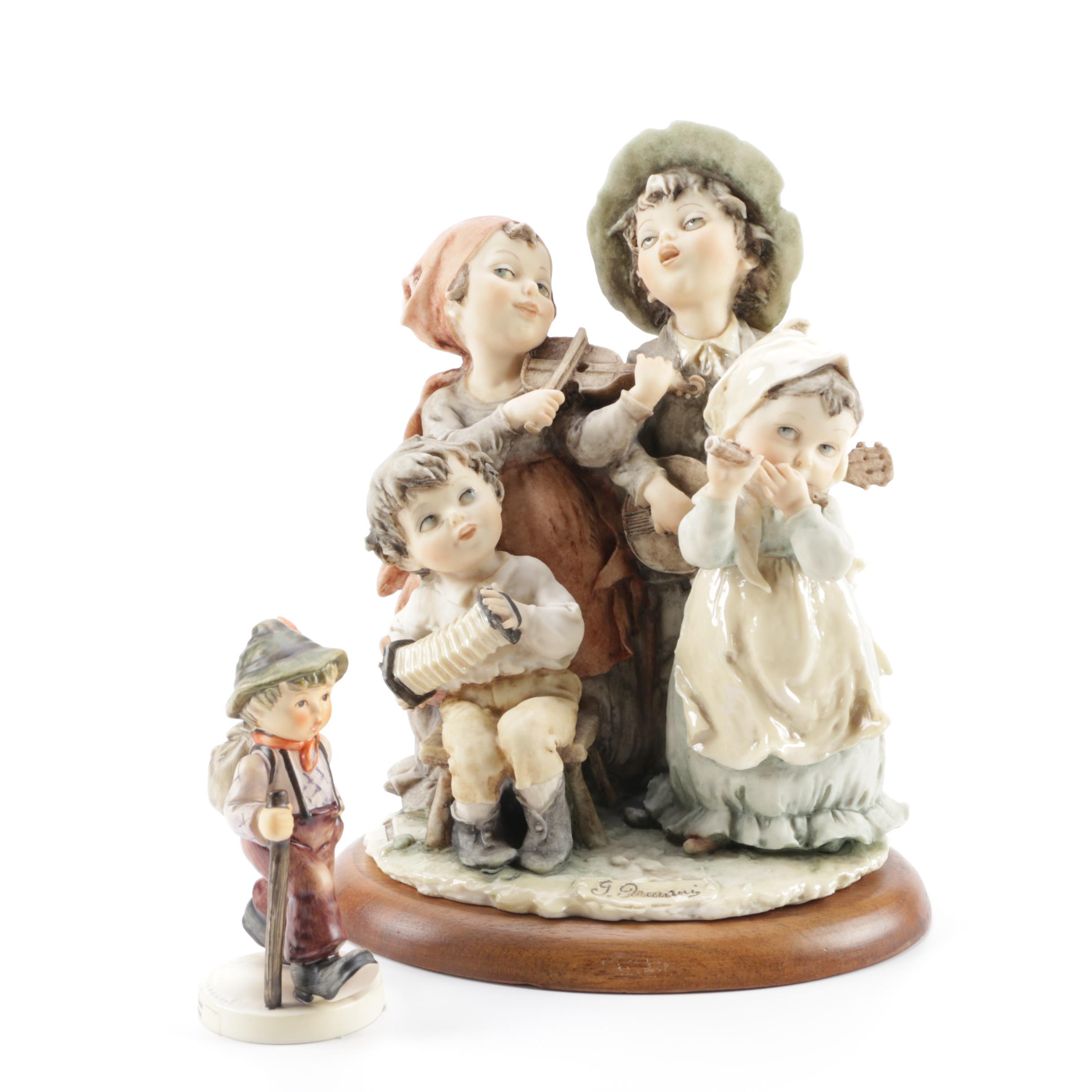 Guiseppe Armani Porcelain Figurine and Hummel "Grandma's Boy"