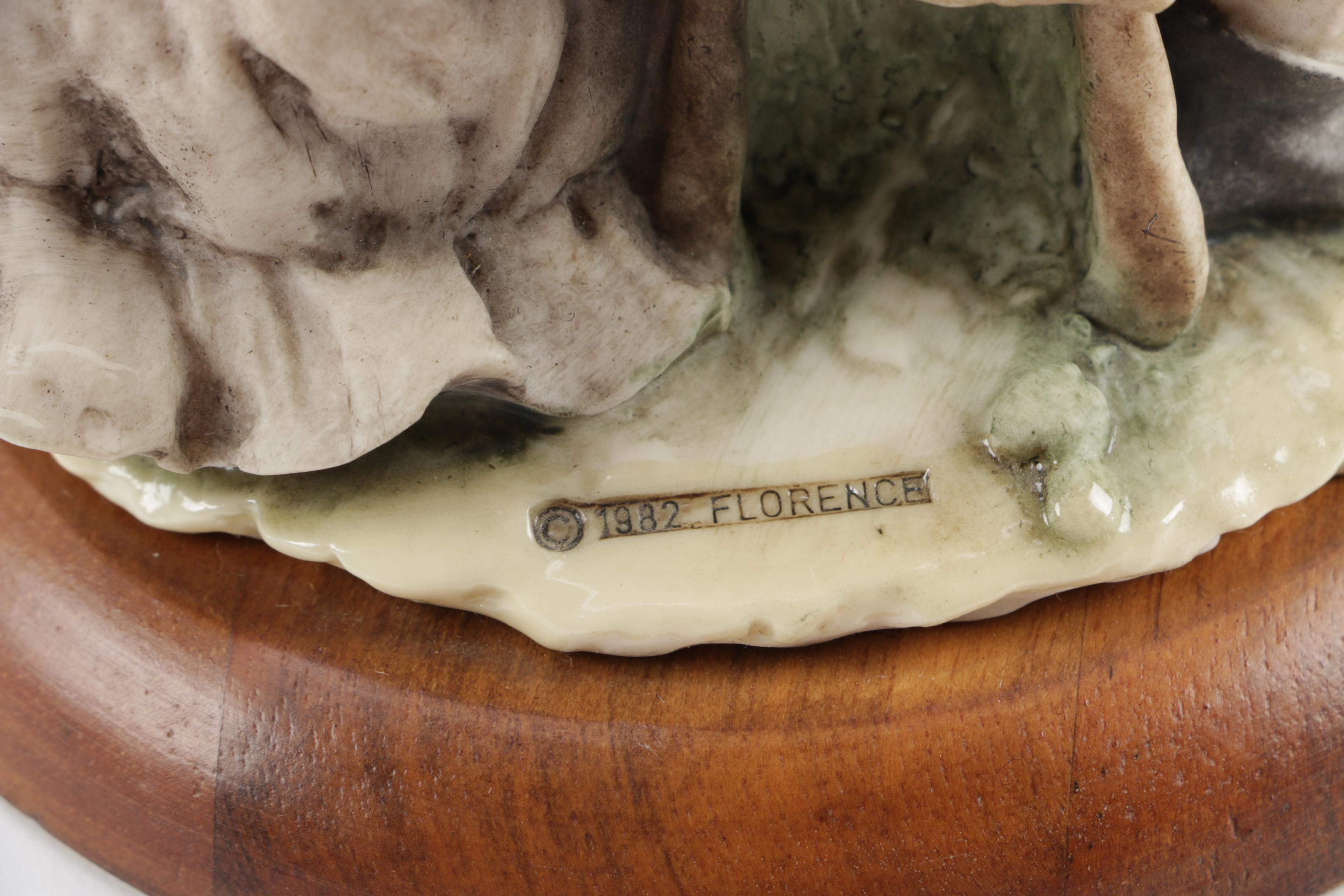 Guiseppe Armani Porcelain Figurine and Hummel "Grandma's Boy"