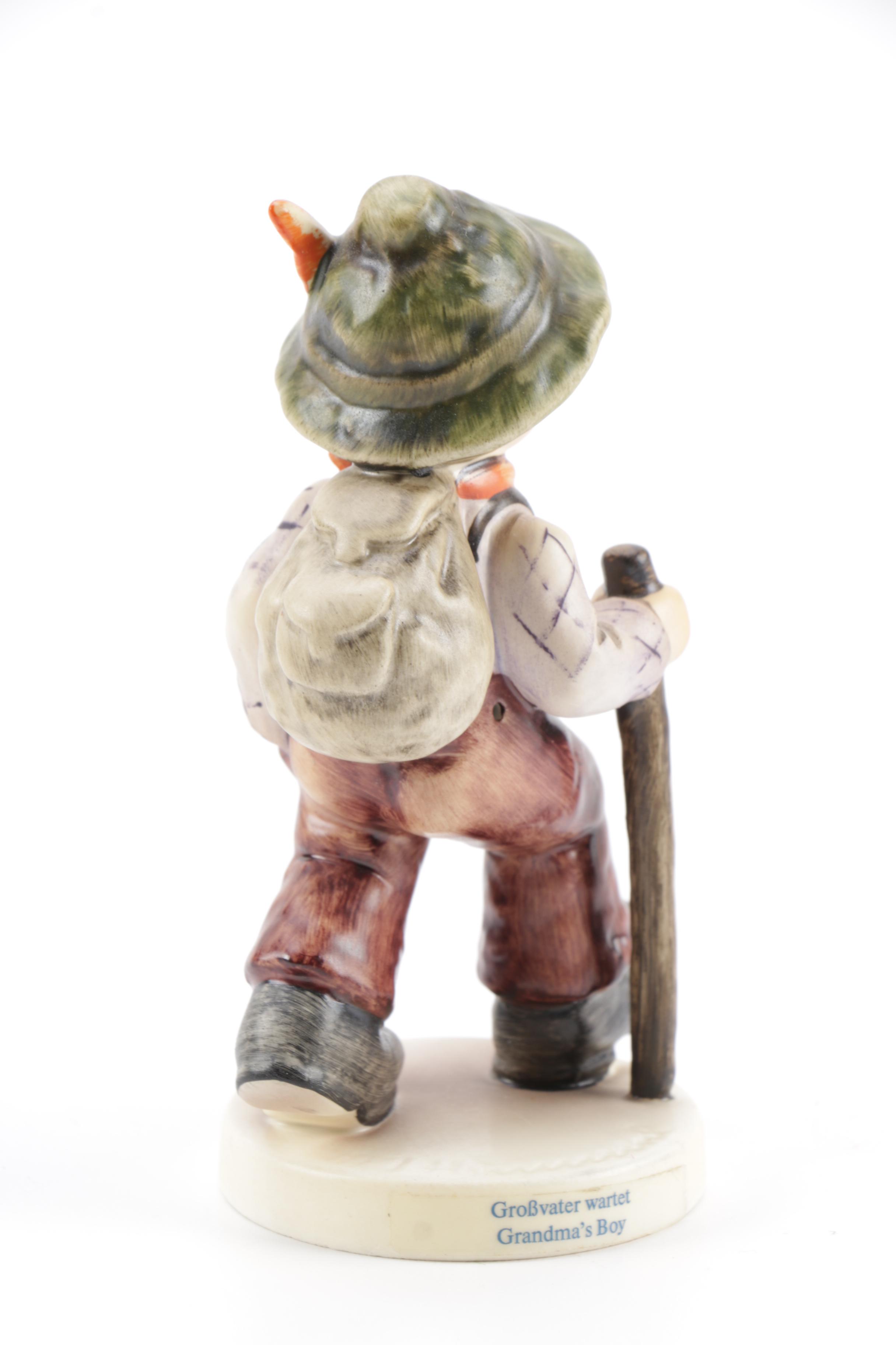 Guiseppe Armani Porcelain Figurine and Hummel "Grandma's Boy"