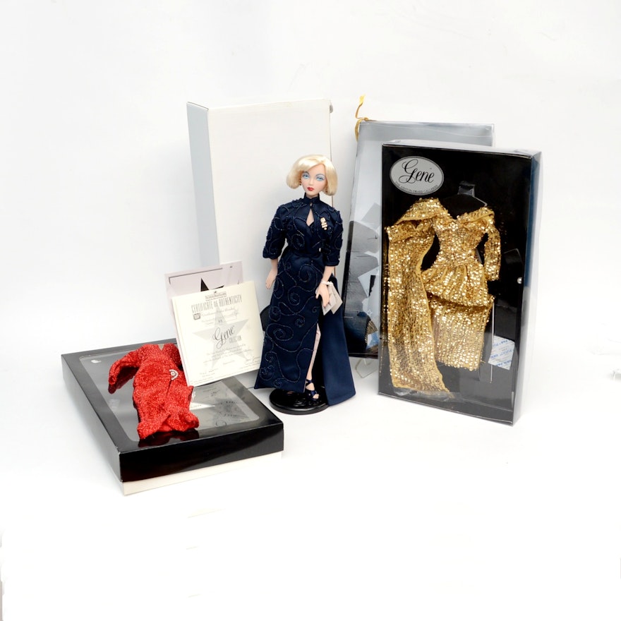 Gene Doll and Three Boxed Outfits