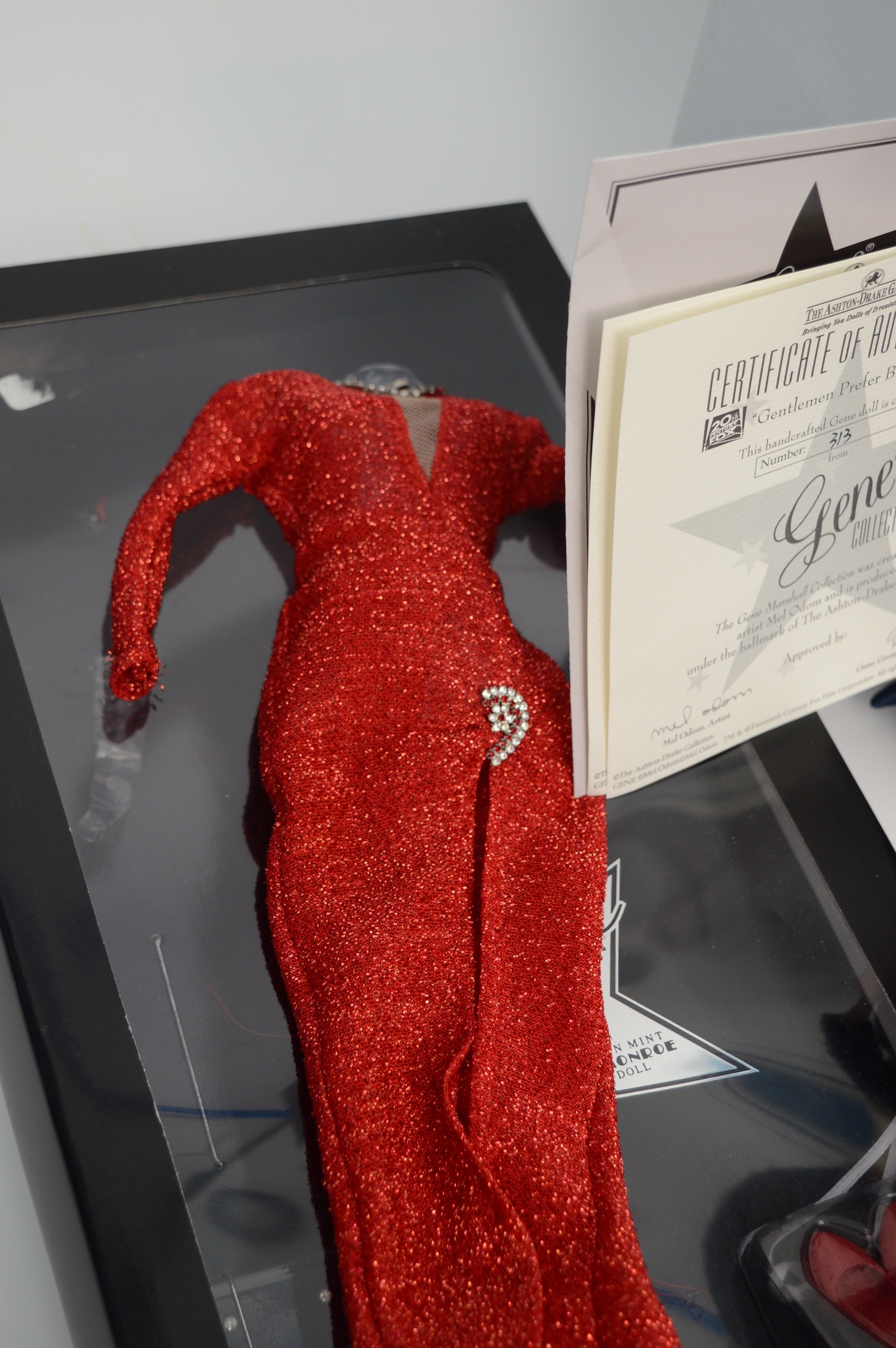 Gene Doll and Three Boxed Outfits