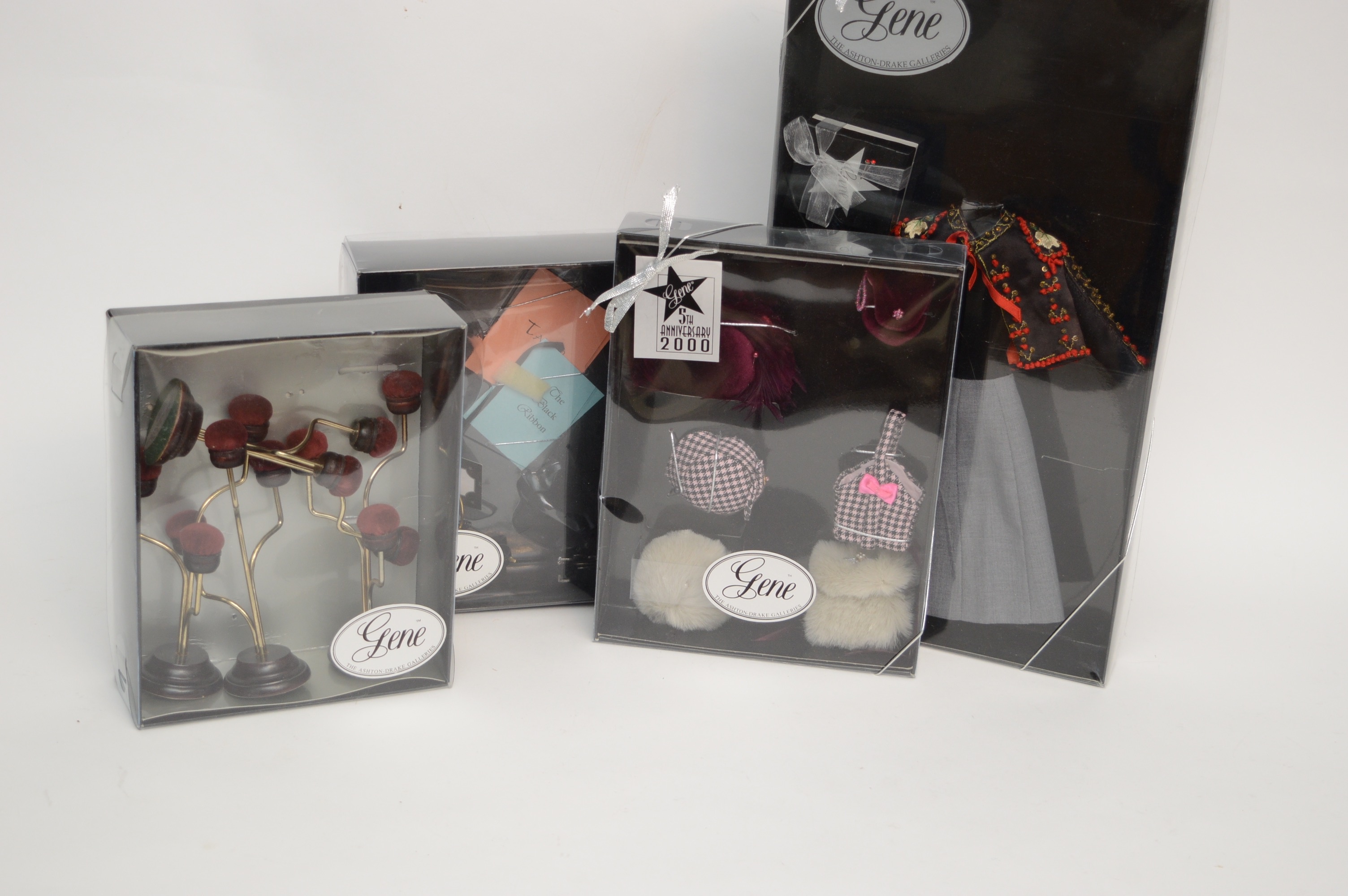 Assortment of Gene Doll Outfits with Boxes