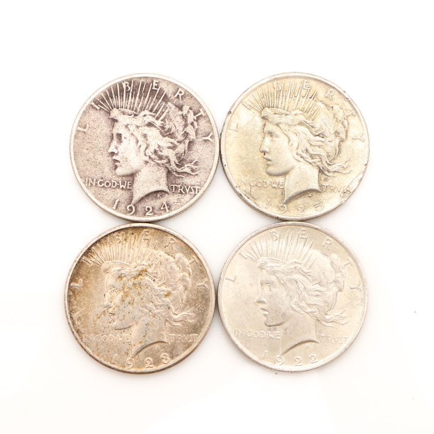 Four Peace Silver Dollars