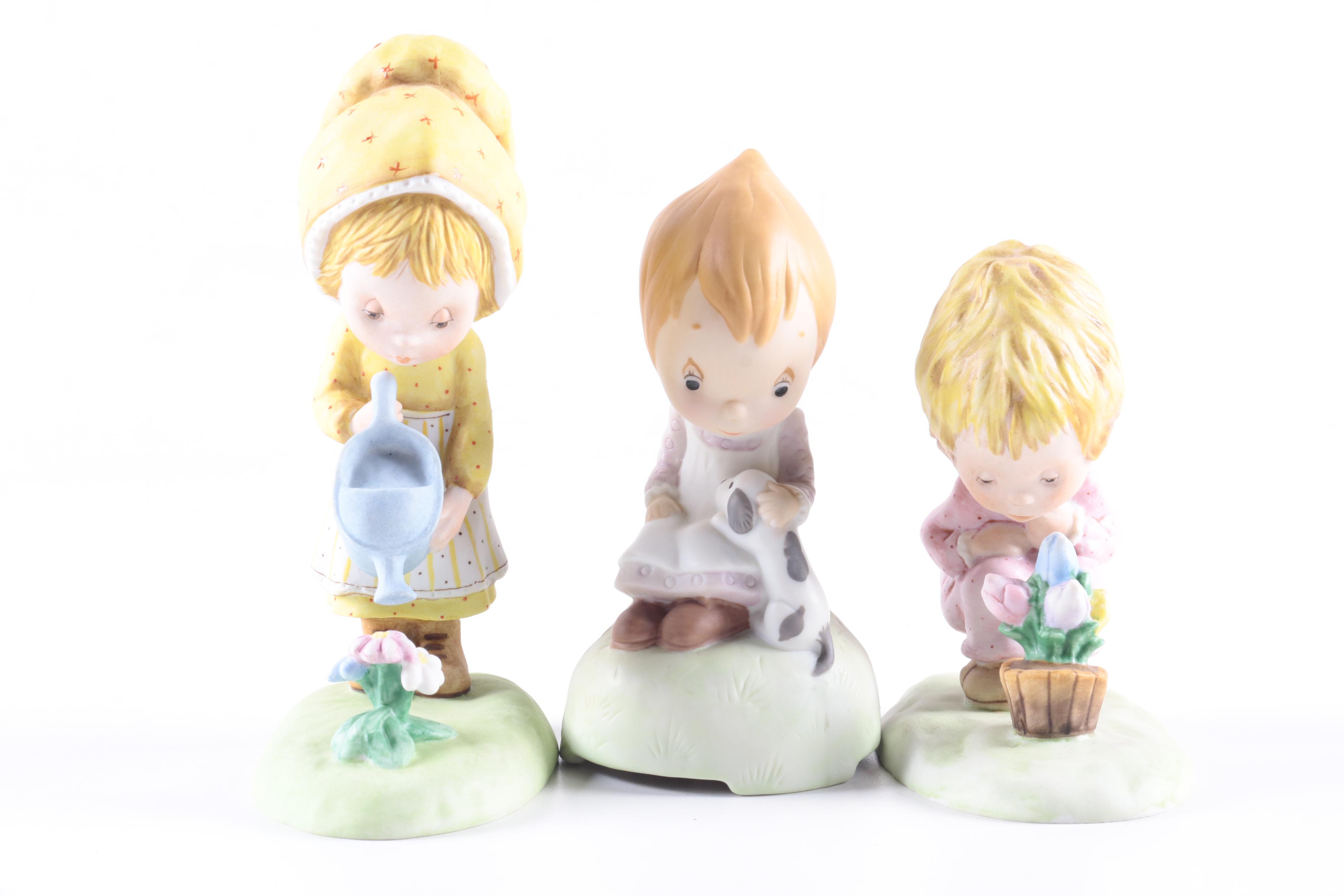 Vintage Porcelain Figurines Including Betsey Clark, Holly Hobbie and Goebel