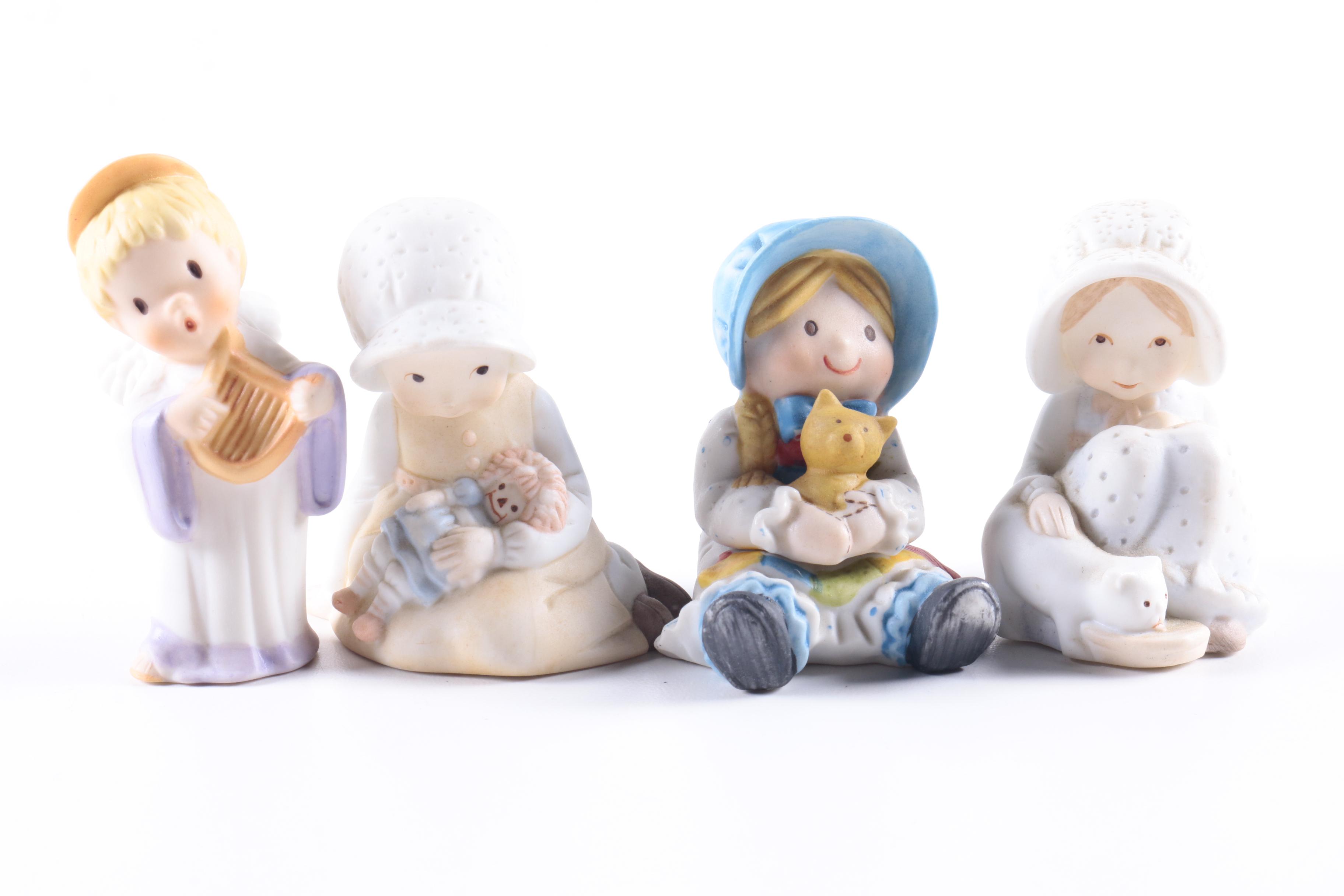 Vintage Porcelain Figurines Including Betsey Clark, Holly Hobbie and Goebel