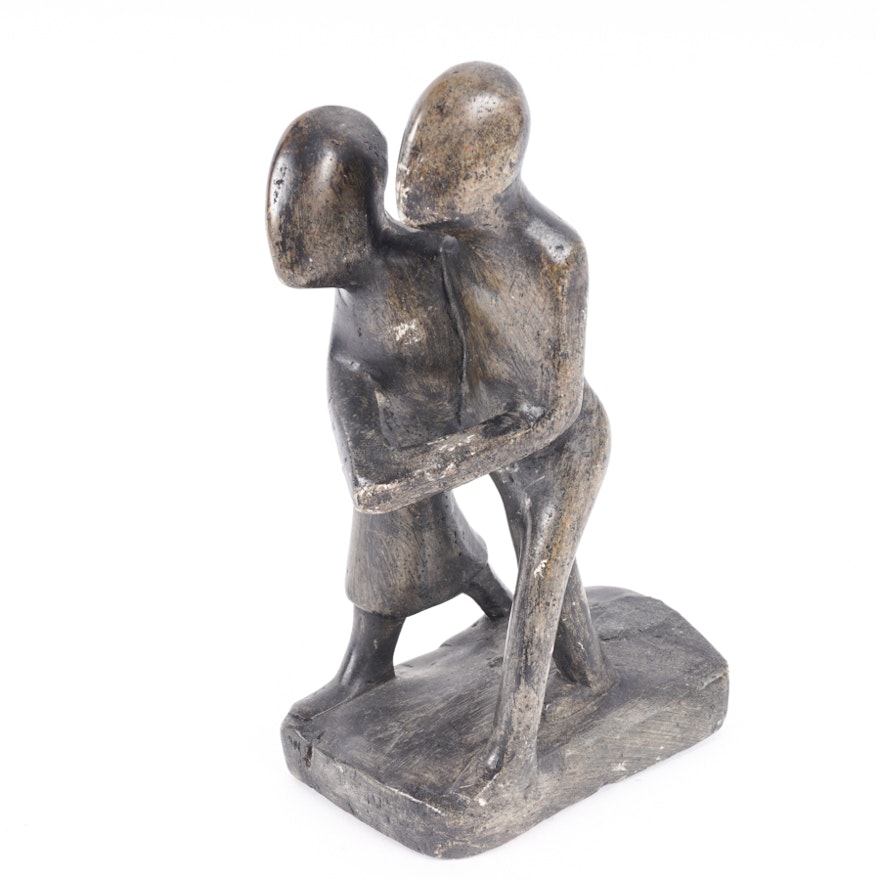 Minimalist Stone Sculpture of a Walking Couple
