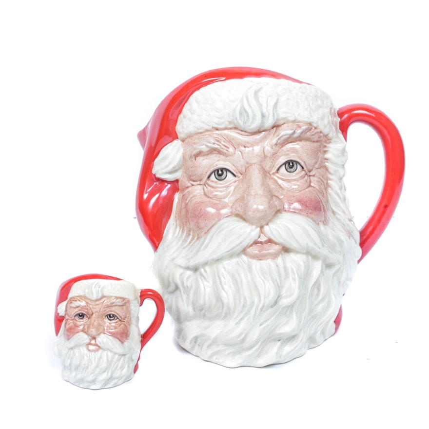 Pair of Royal Doulton Santa Pitchers