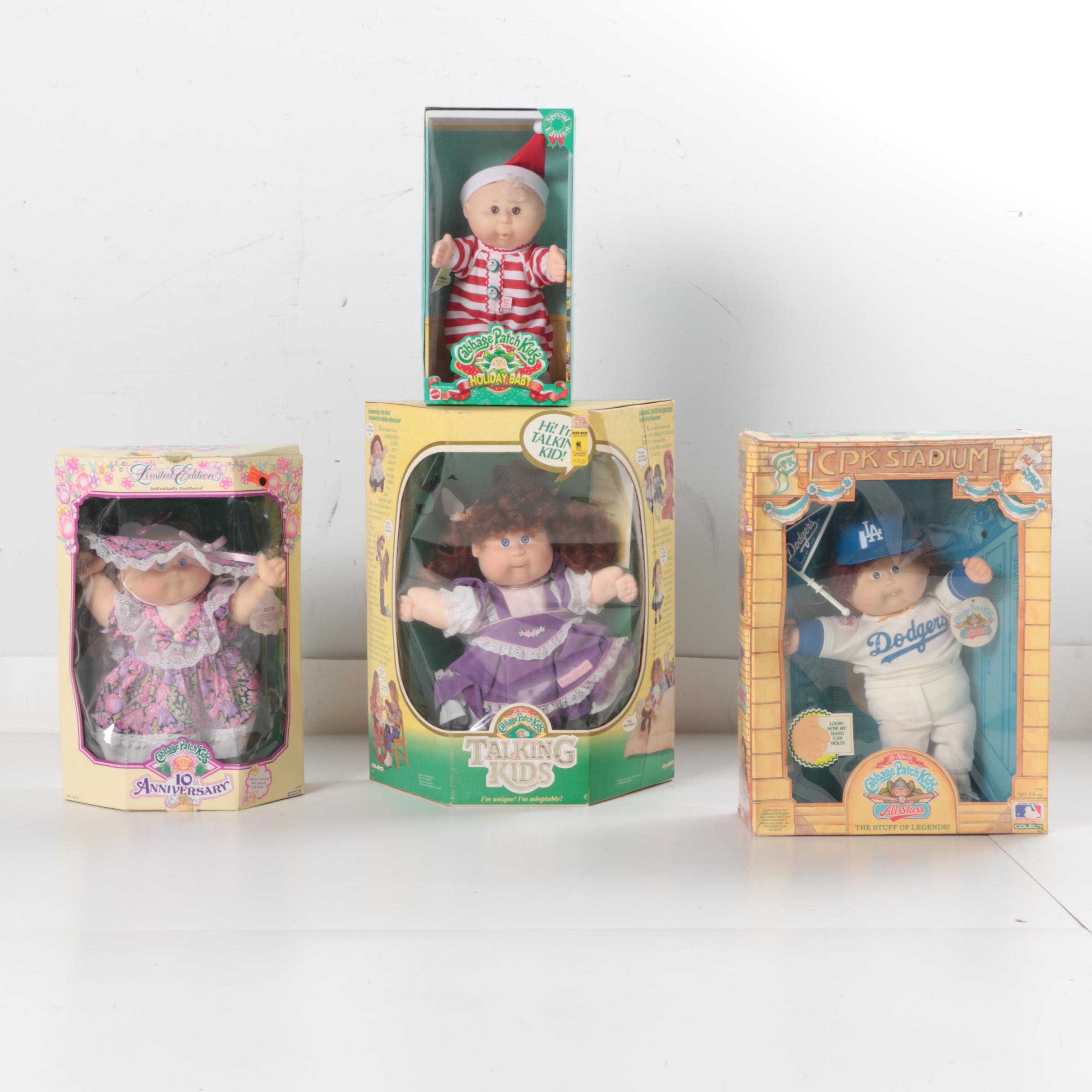 Assortment of Cabbage Patch Kids Including Holiday Baby