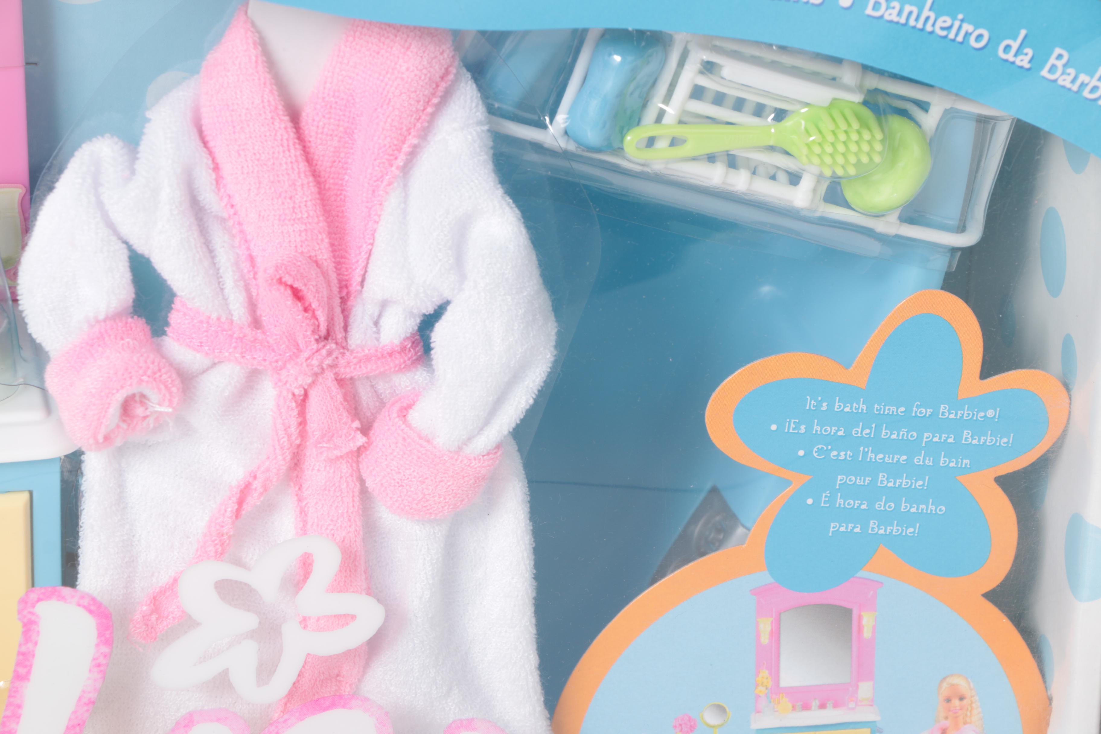 Four Barbie Furniture Sets