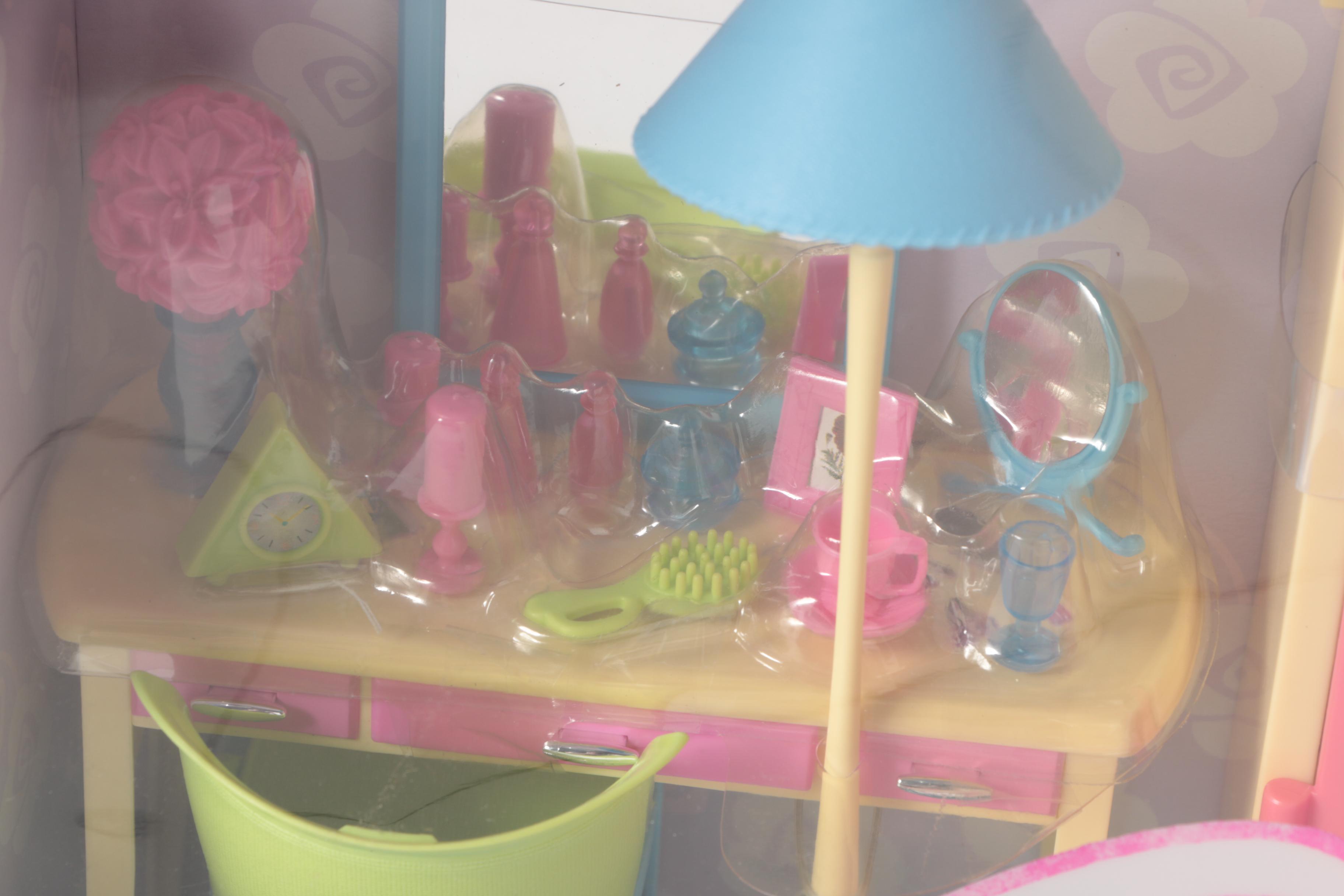 Four Barbie Furniture Sets