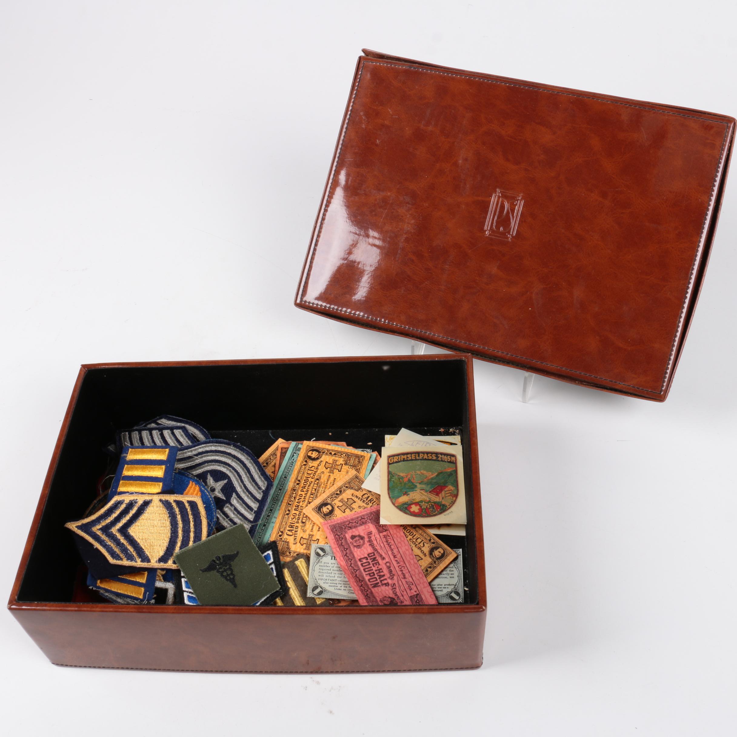 Assortment of Badges and Coupons in a Cardboard Box