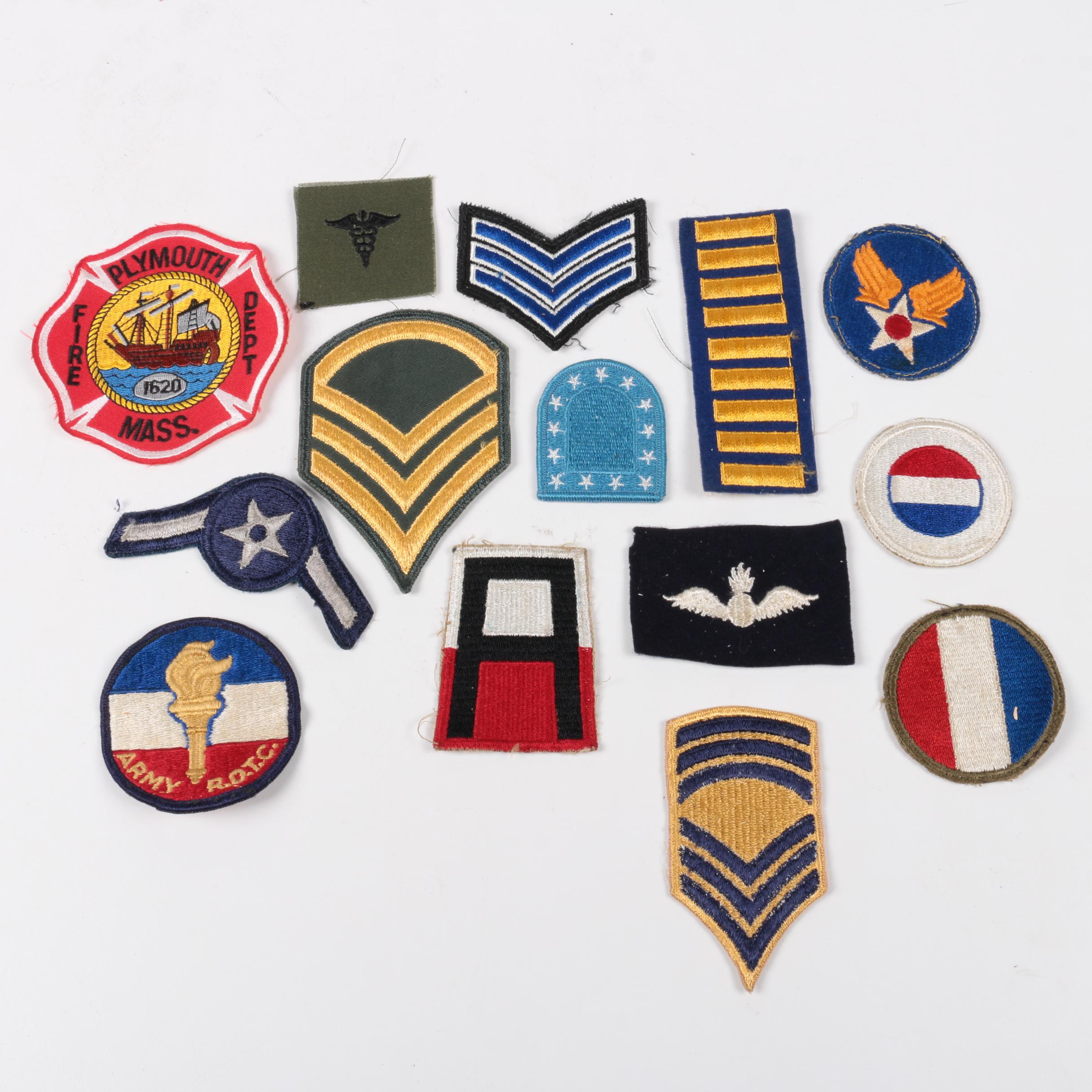 Assortment of Badges and Coupons in a Cardboard Box