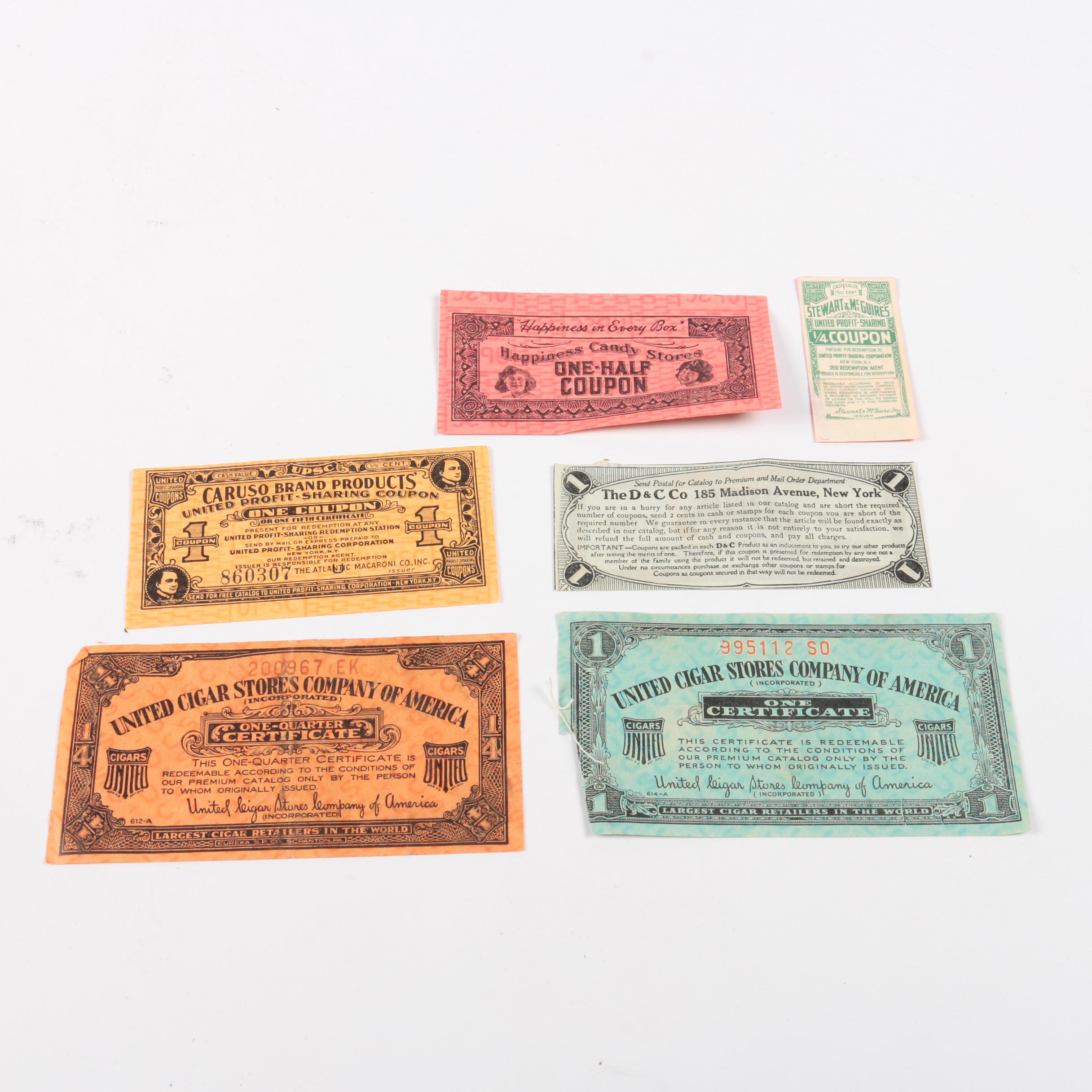 Assortment of Badges and Coupons in a Cardboard Box