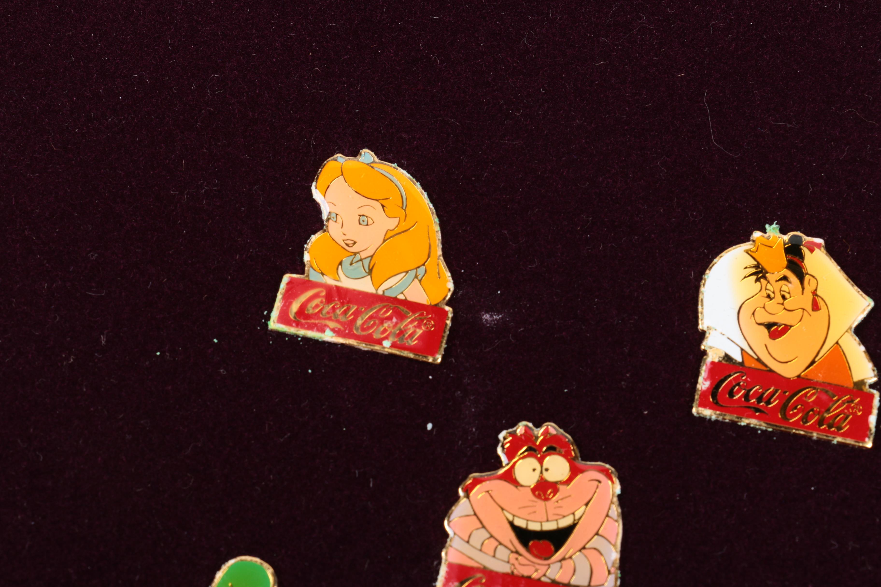 Collection of Disney and Coca-Cola Metal Pins