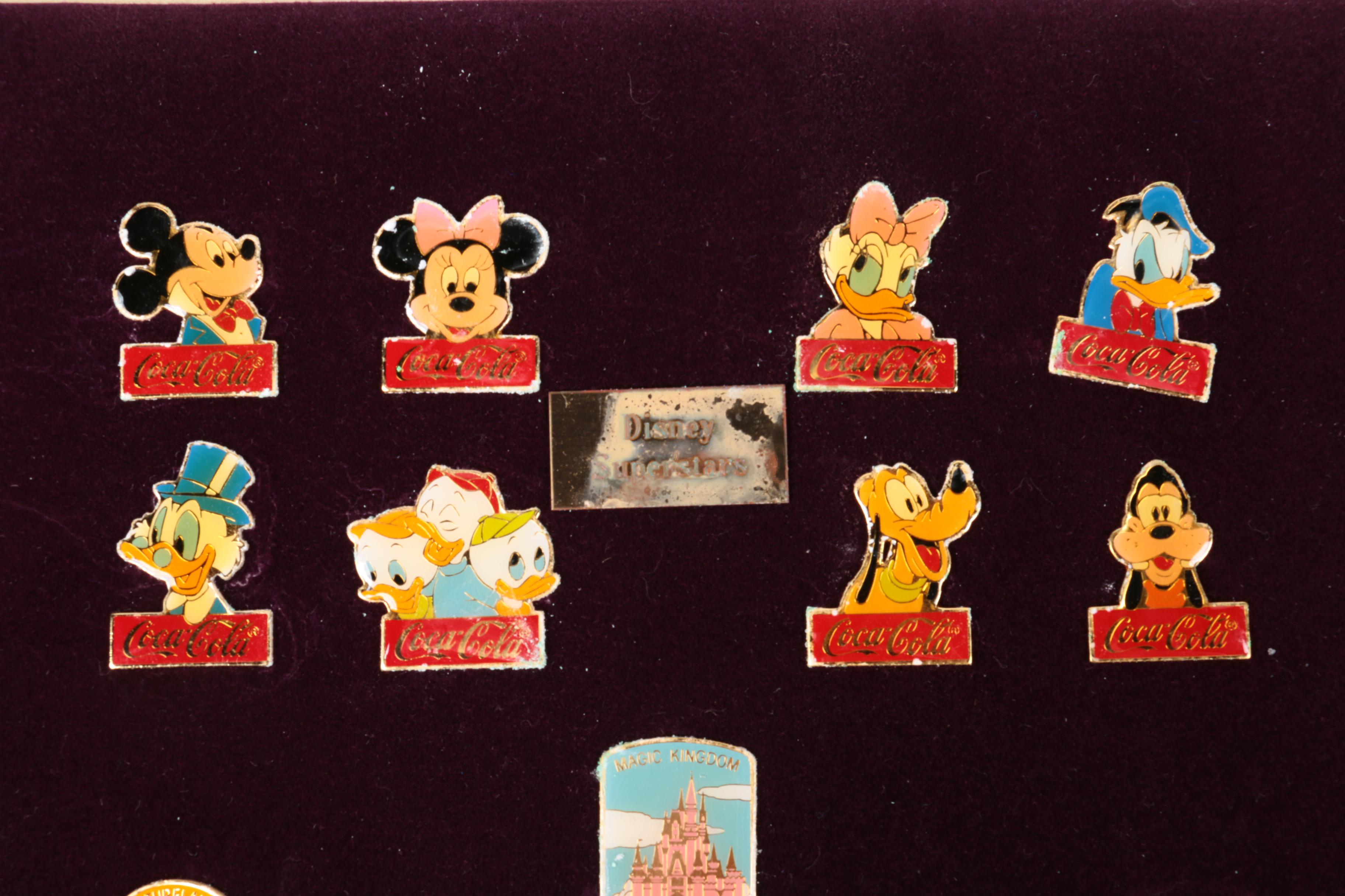 Collection of Disney and Coca-Cola Metal Pins