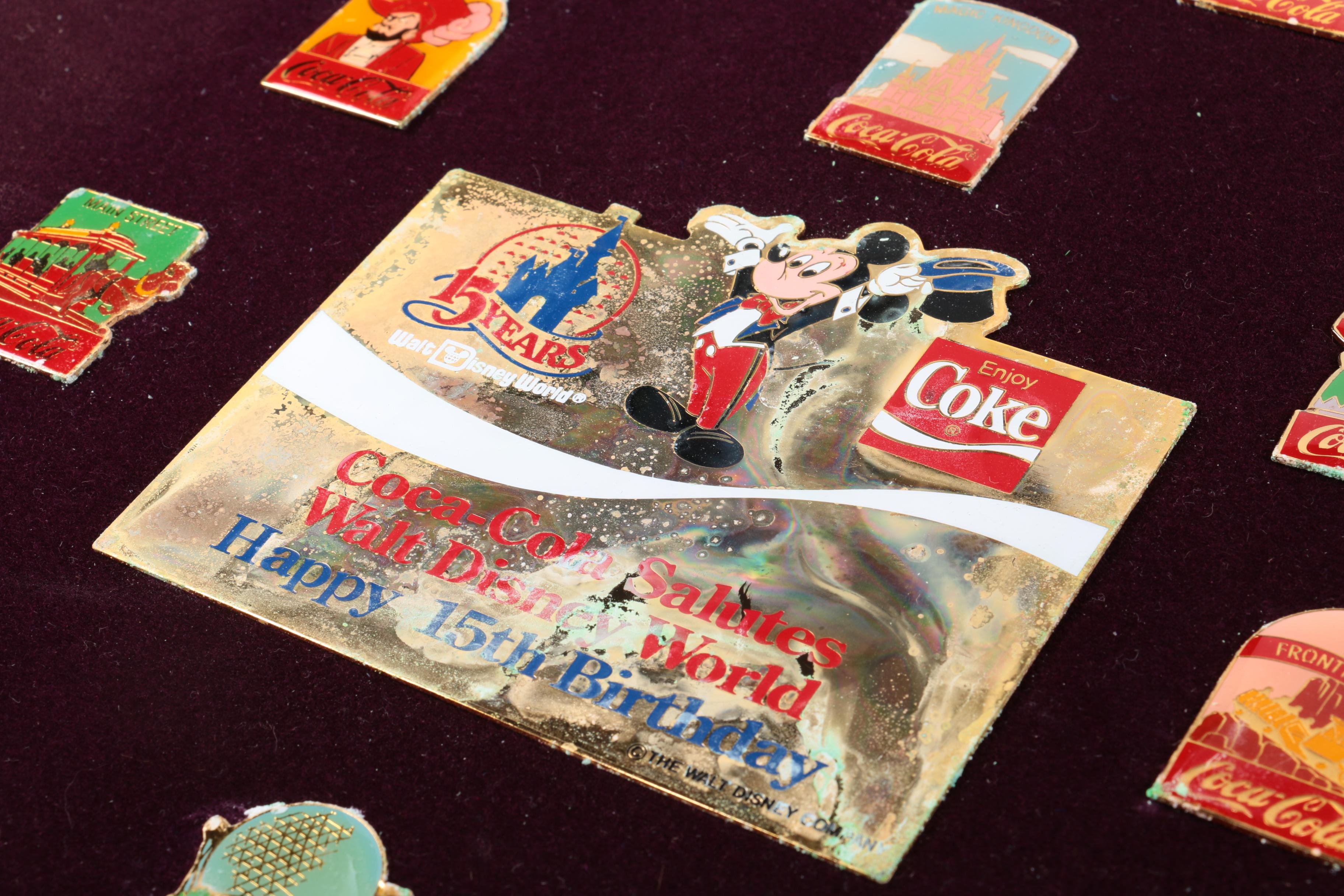 Collection of Disney and Coca-Cola Metal Pins