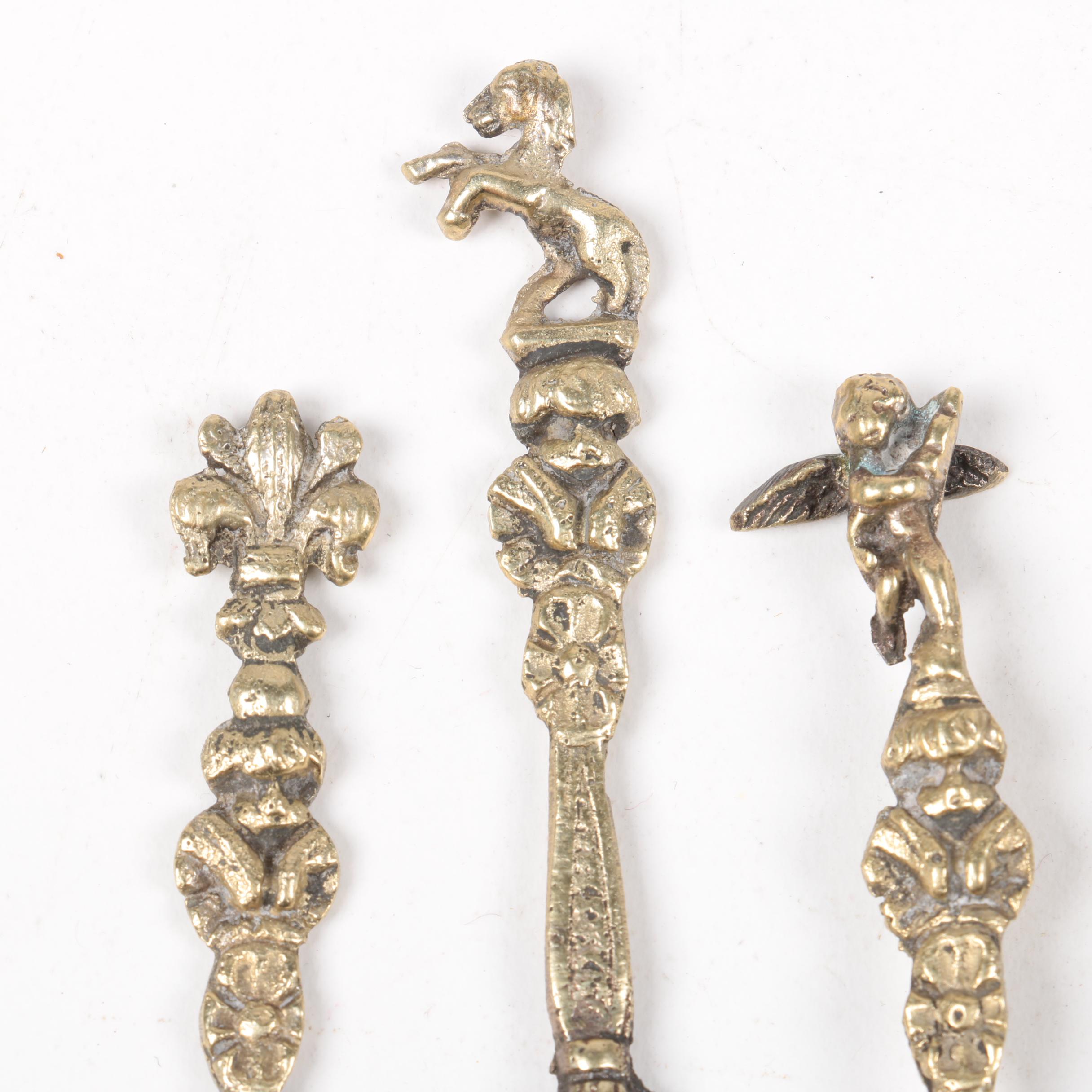Brass Figural Utensils with Italian Teaspoons