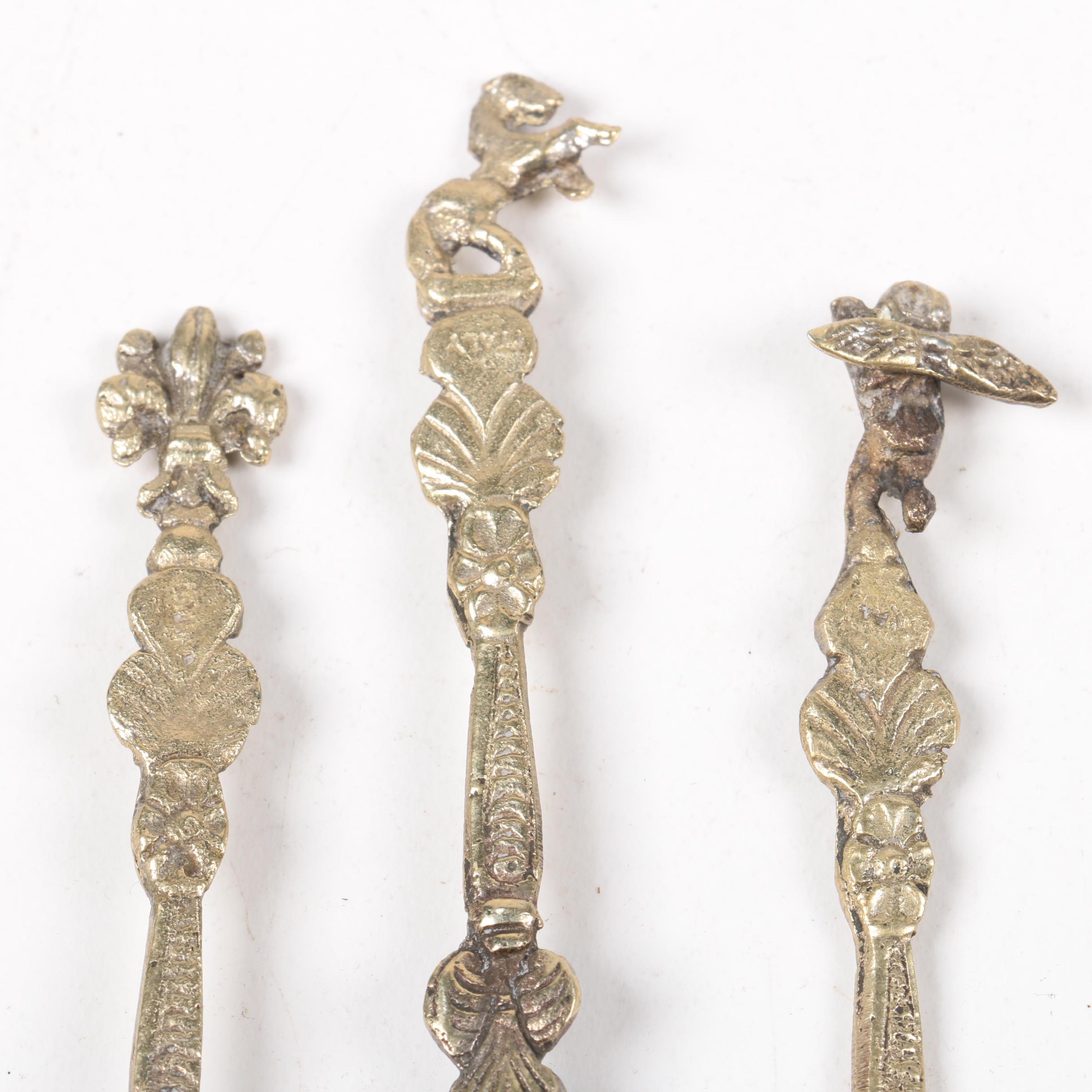 Brass Figural Utensils with Italian Teaspoons