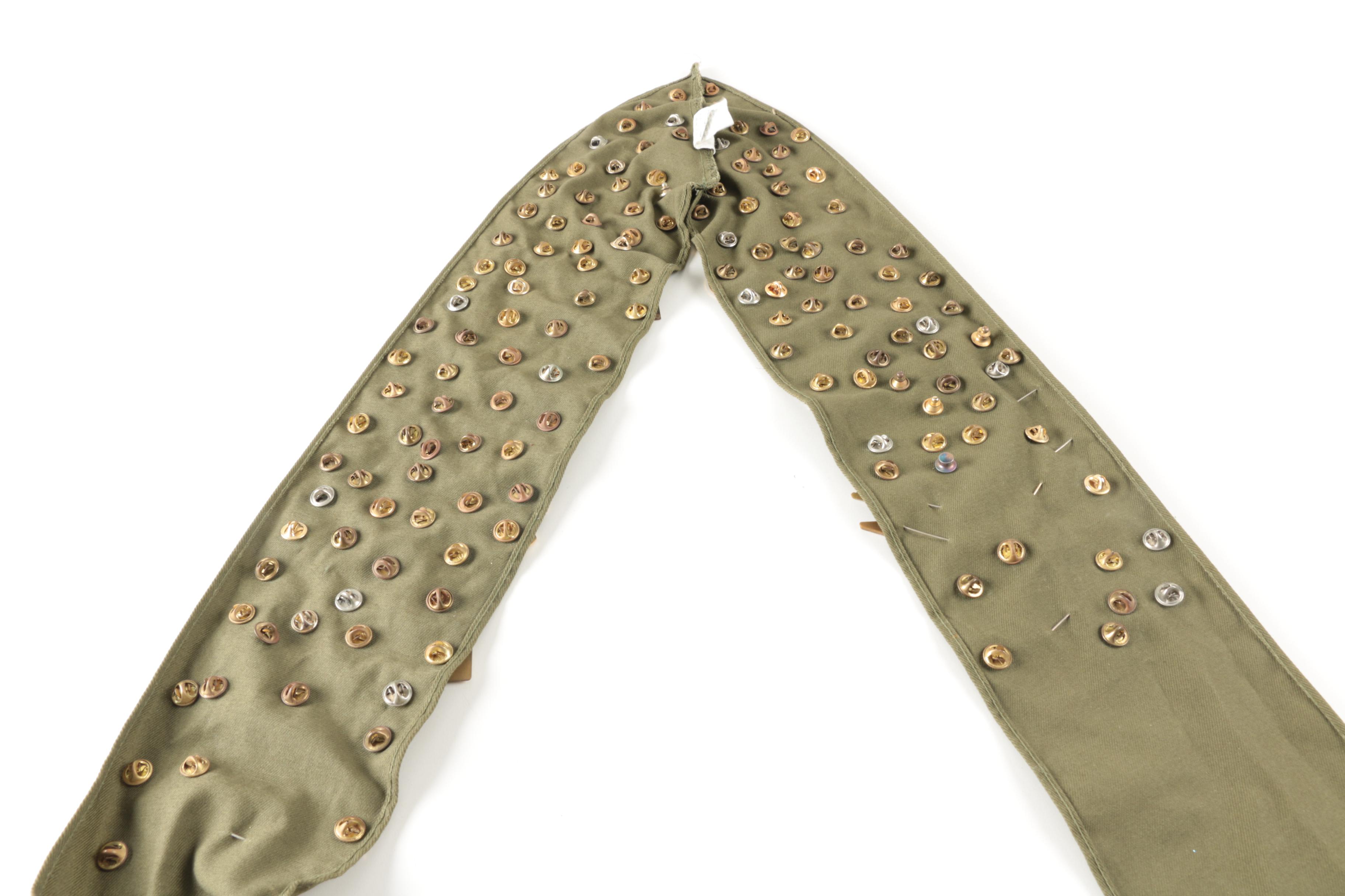 Collection of Pinbacks on Boy Scout Sash