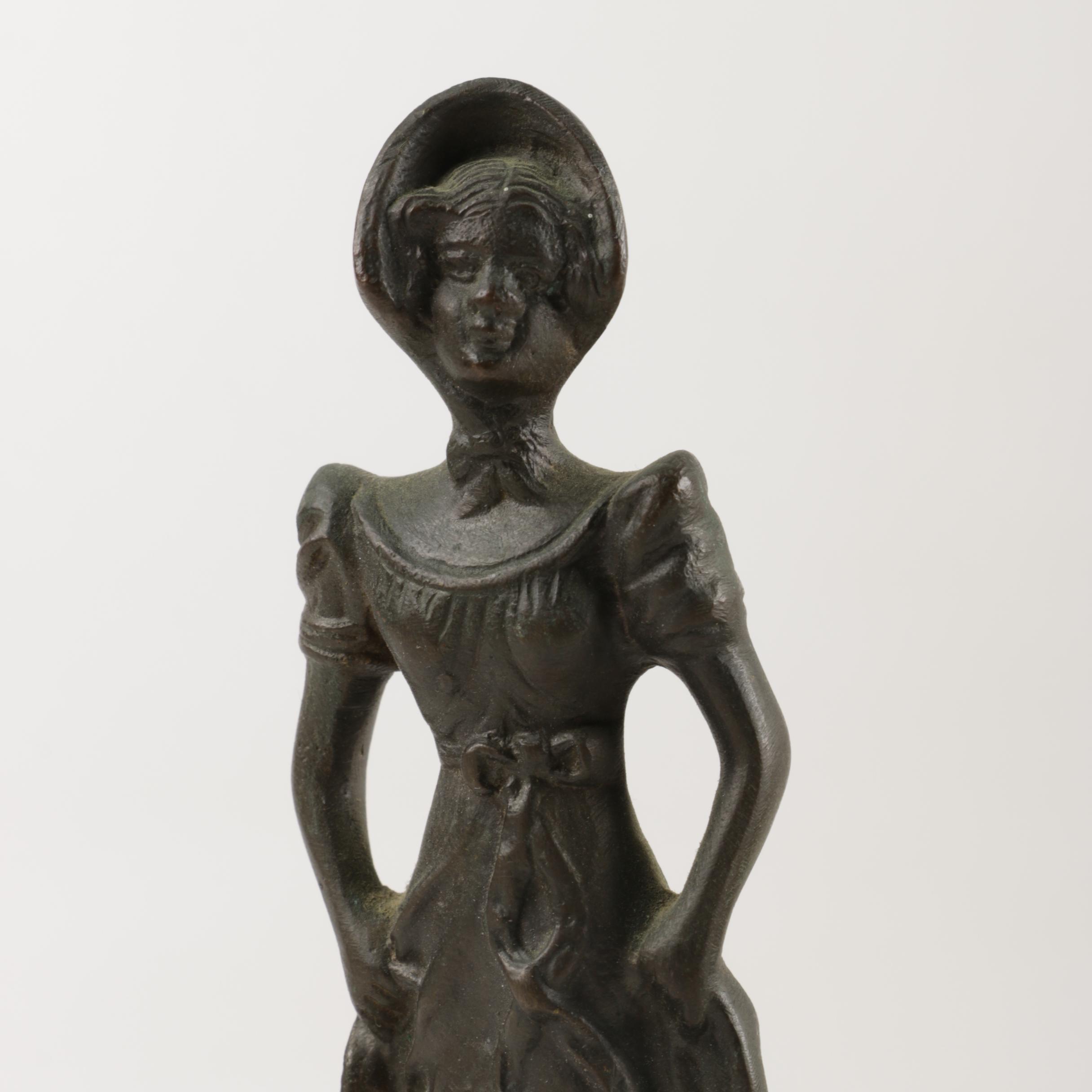 Decorative Brass Bowl and Cast Iron Figurine