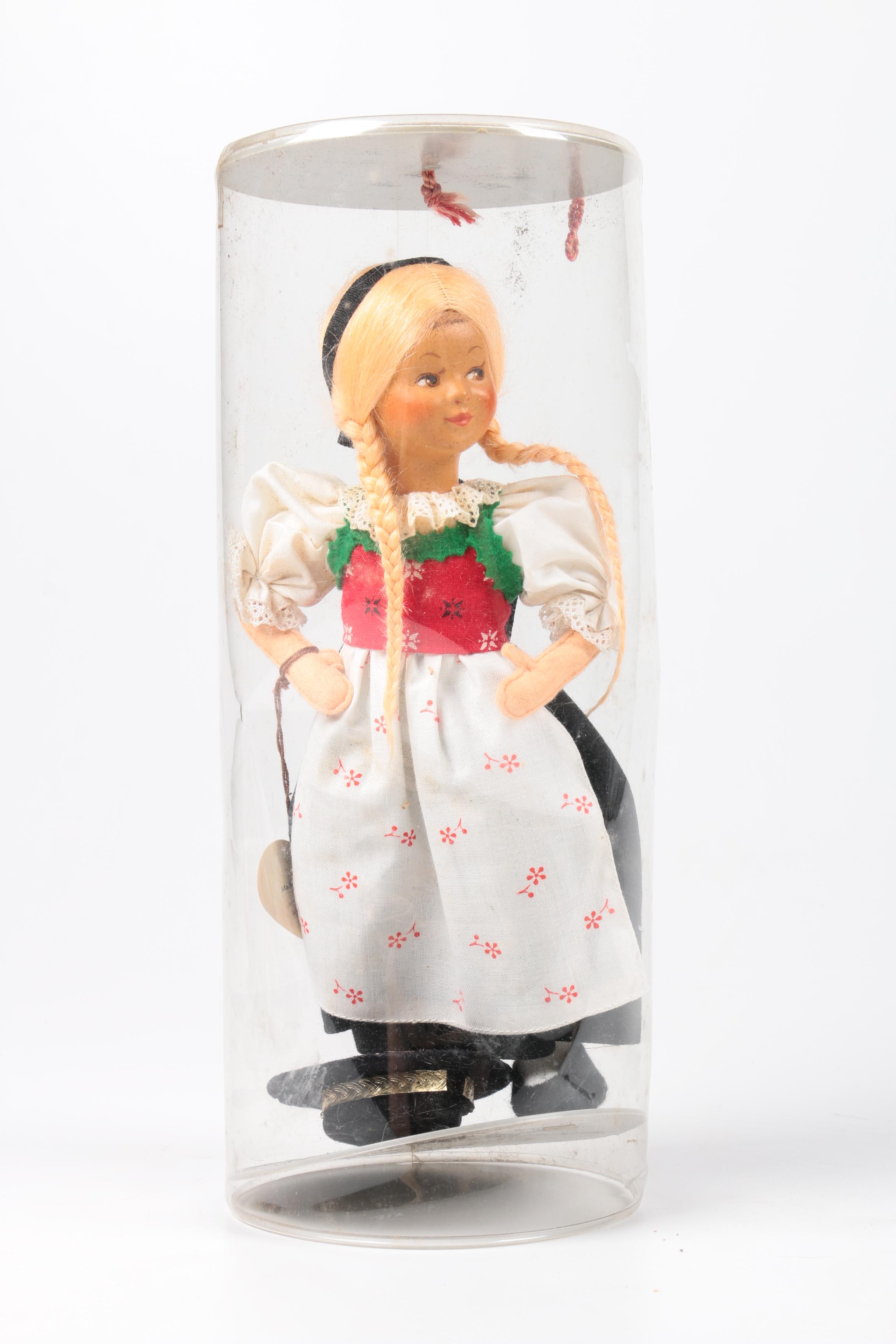 Assortment of Chinese Ceramic Dolls with Tapestry