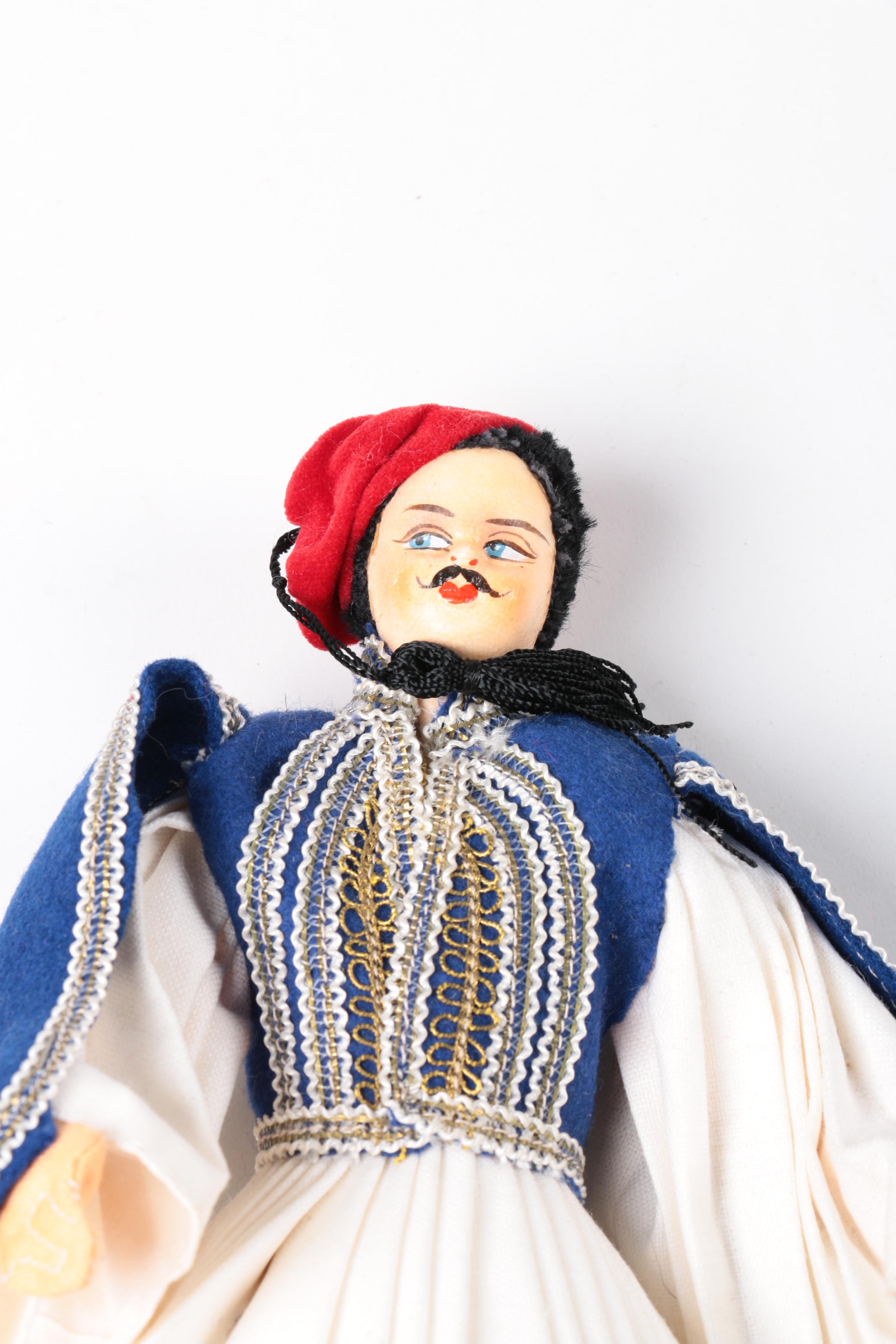 Assortment of Chinese Ceramic Dolls with Tapestry