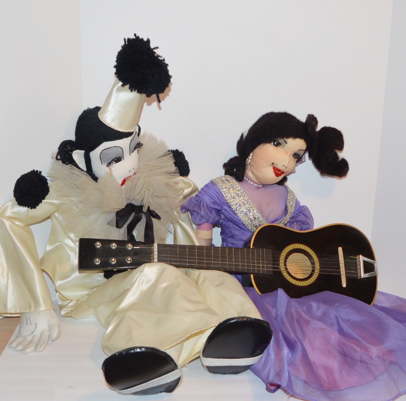 Pair of Hand Made Dolls and a Ukulele