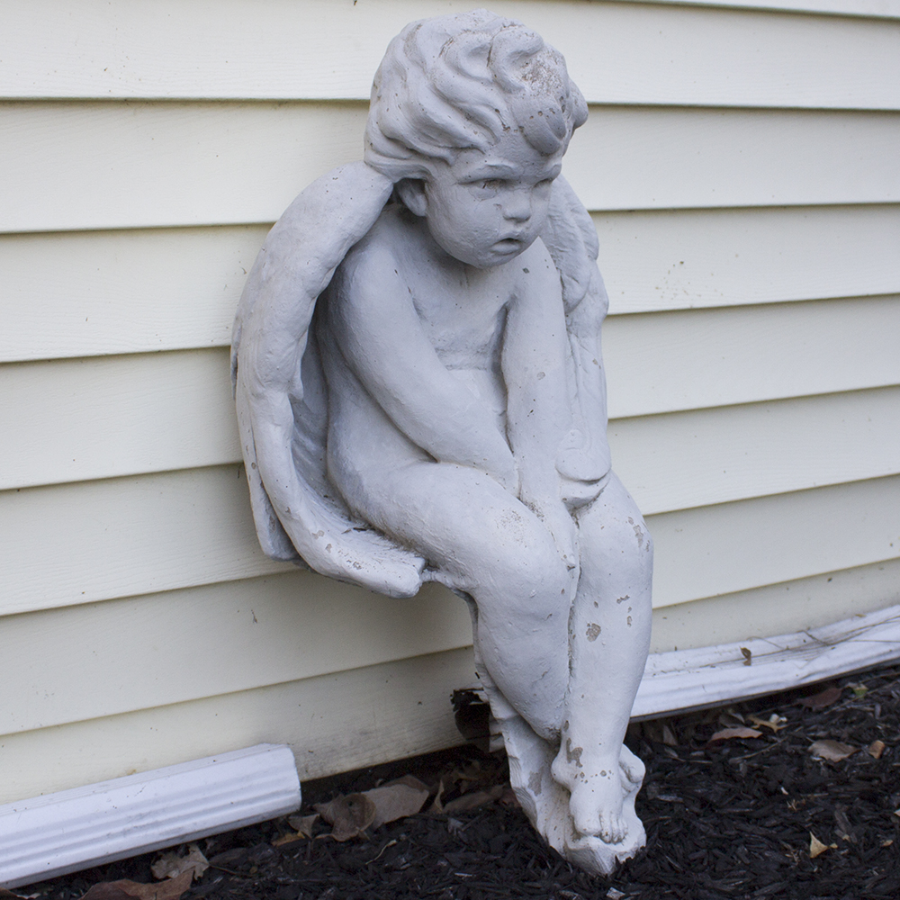 Seated Cherub Statue