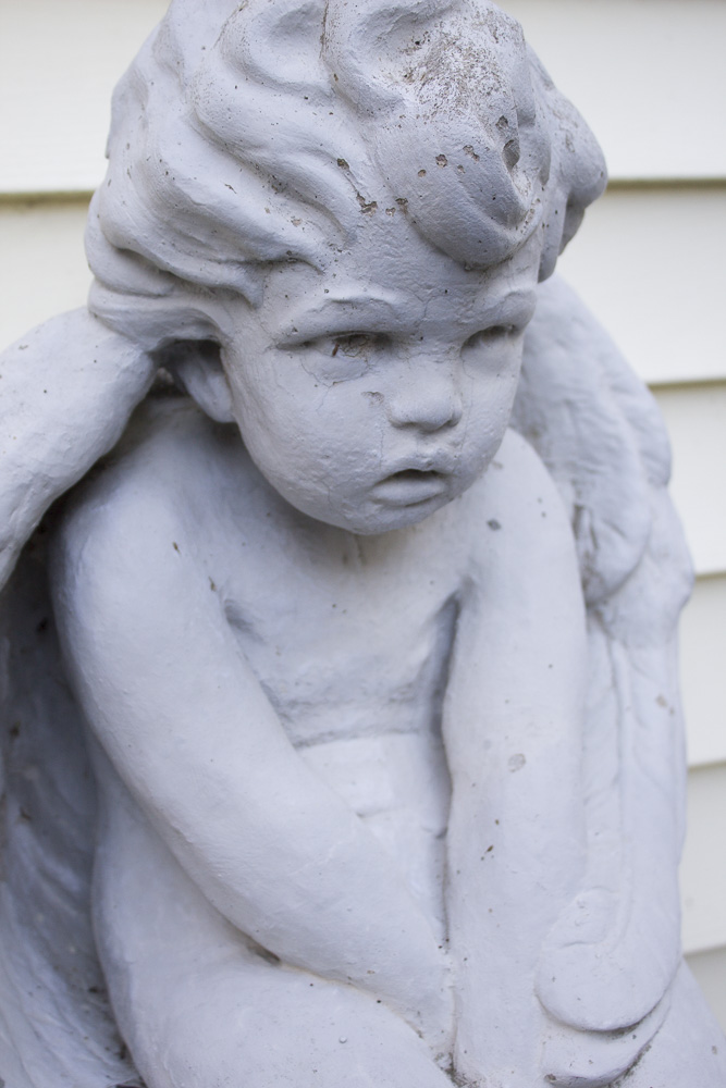 Seated Cherub Statue