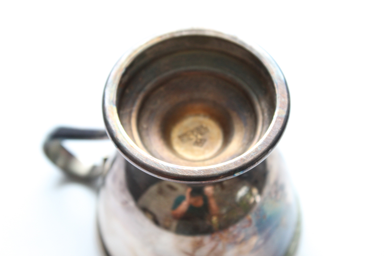 Twelve Silver Plate Teacups