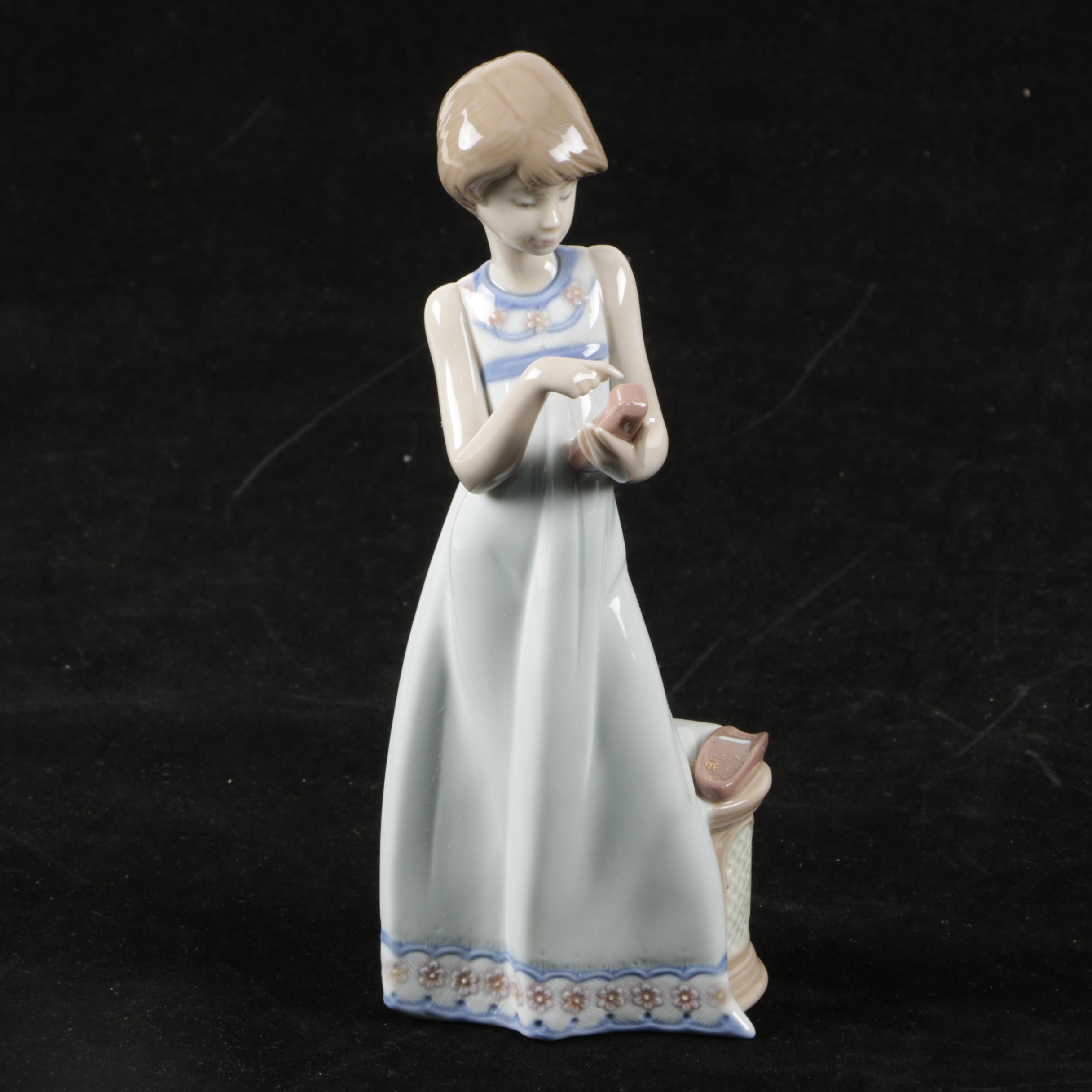 Lladró "Calling a Friend" Figurine