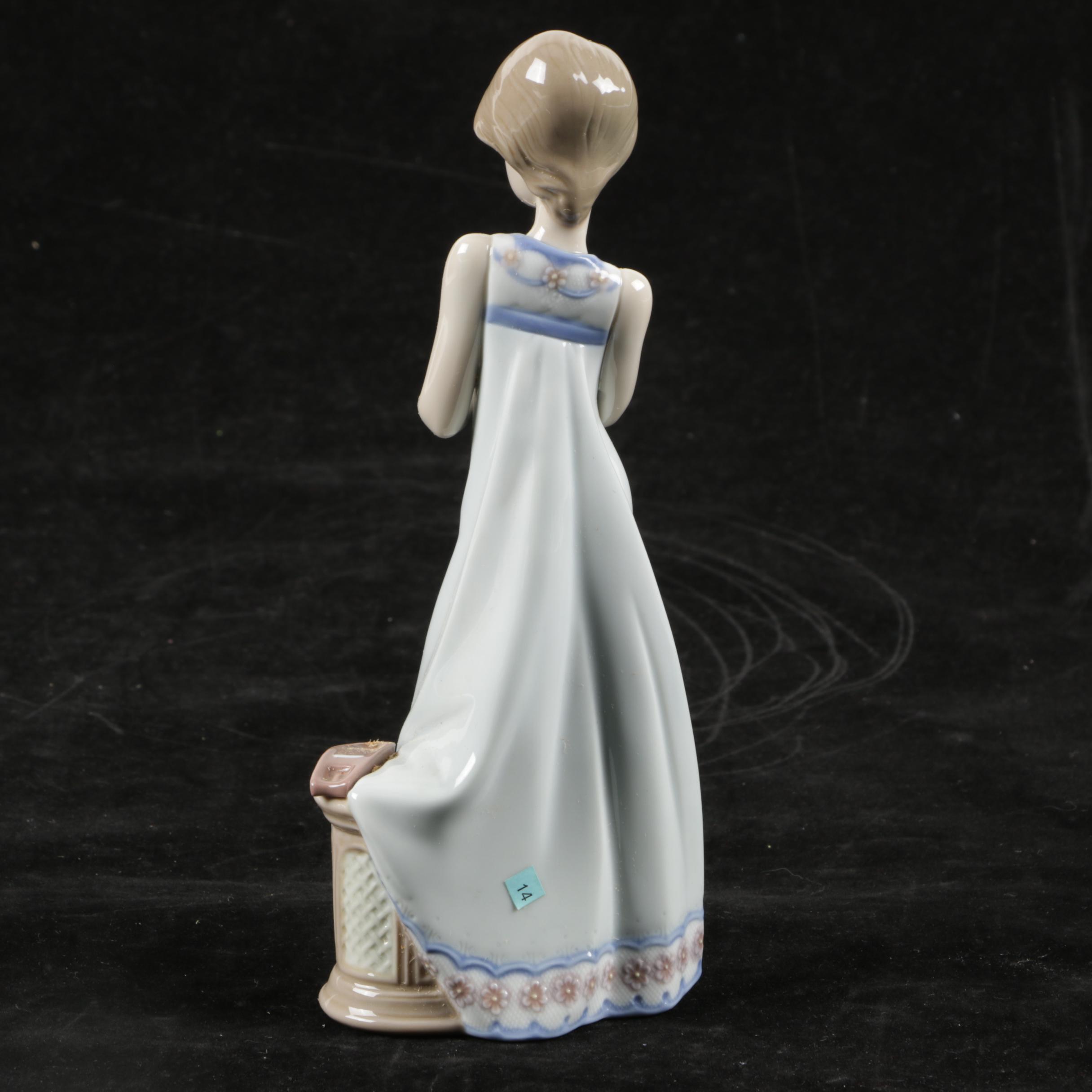 Lladró "Calling a Friend" Figurine