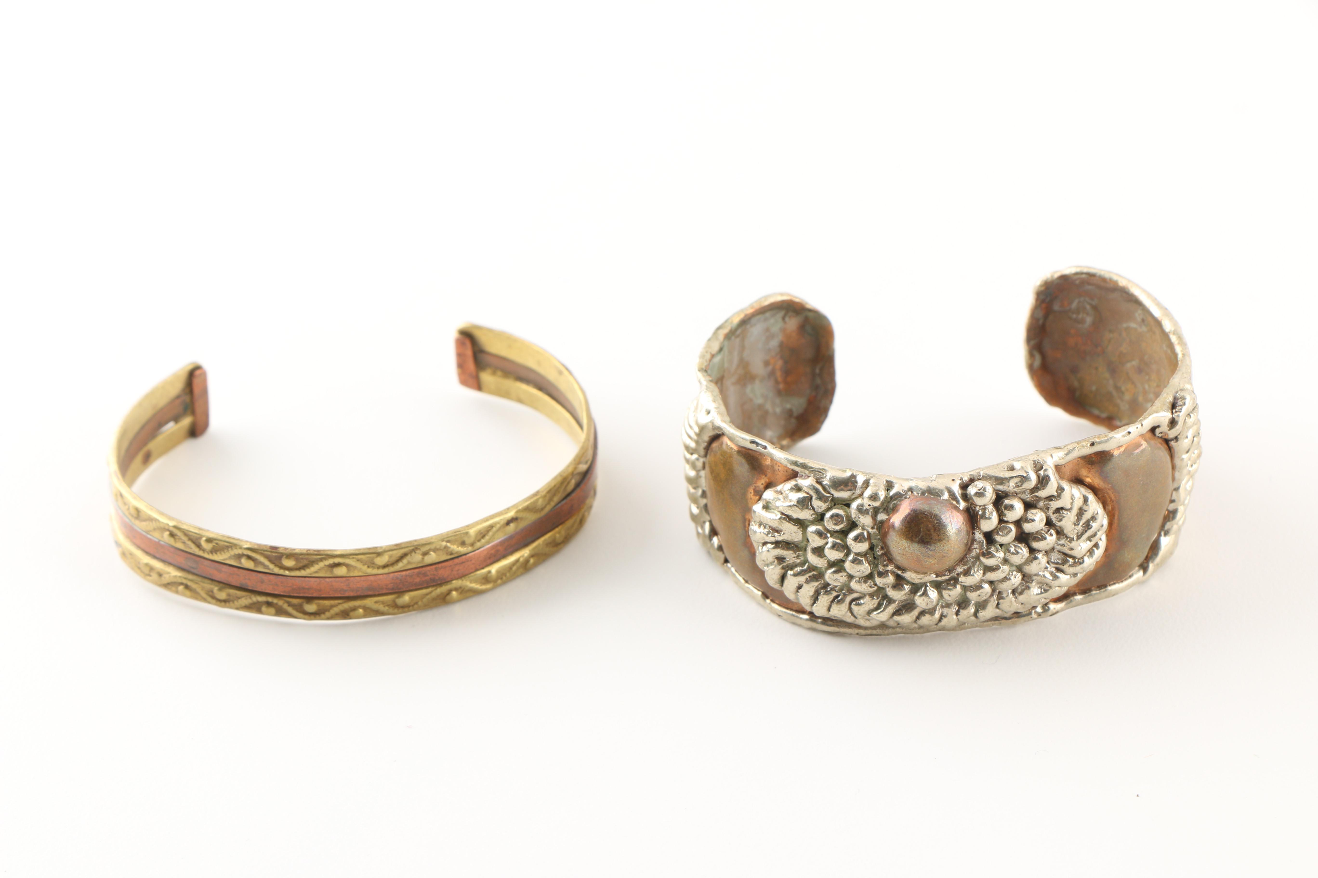 Assortment of Costume Jewelry Including a Sterling Silver Bracelet