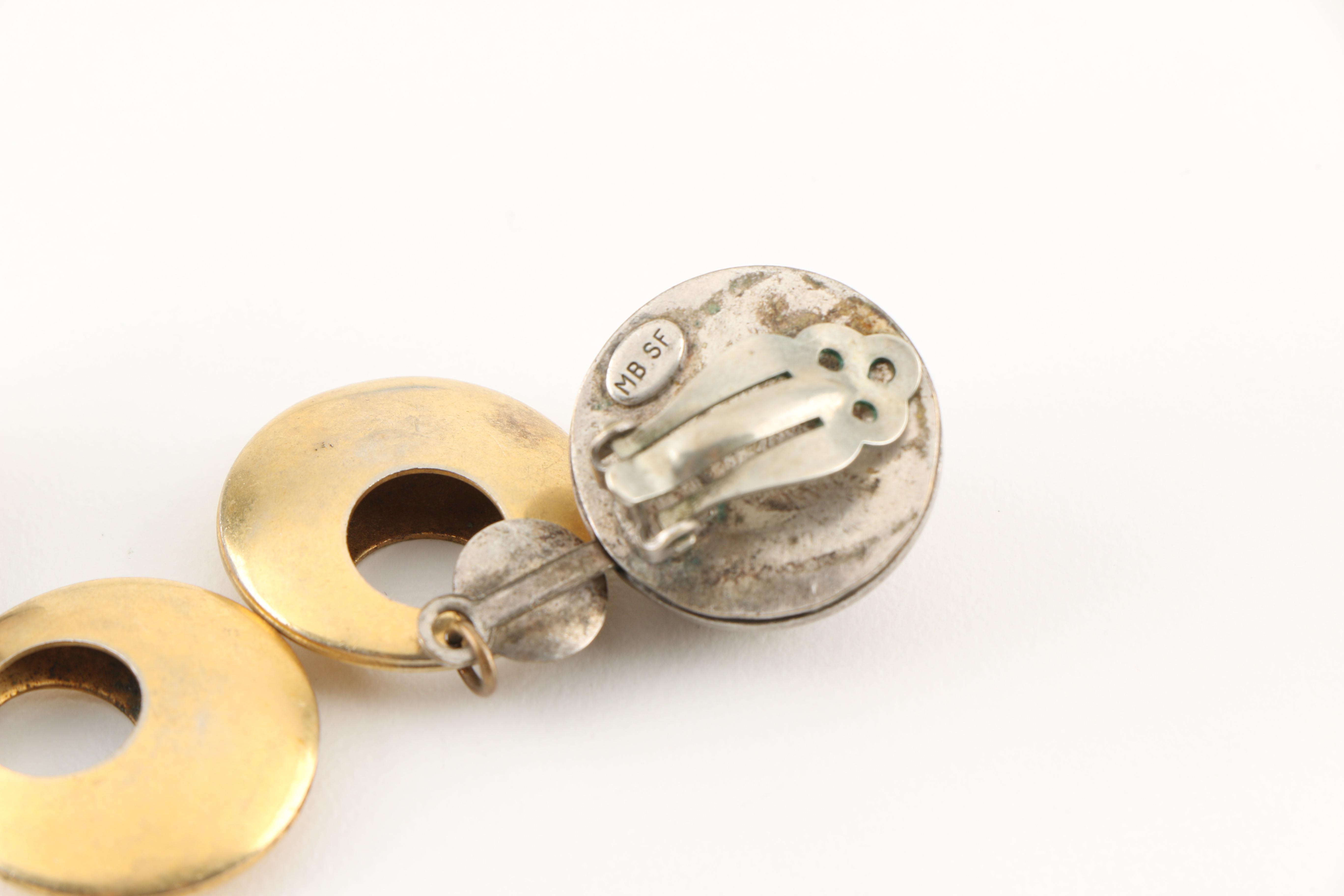 Assortment of Costume Jewelry Including a Sterling Silver Bracelet