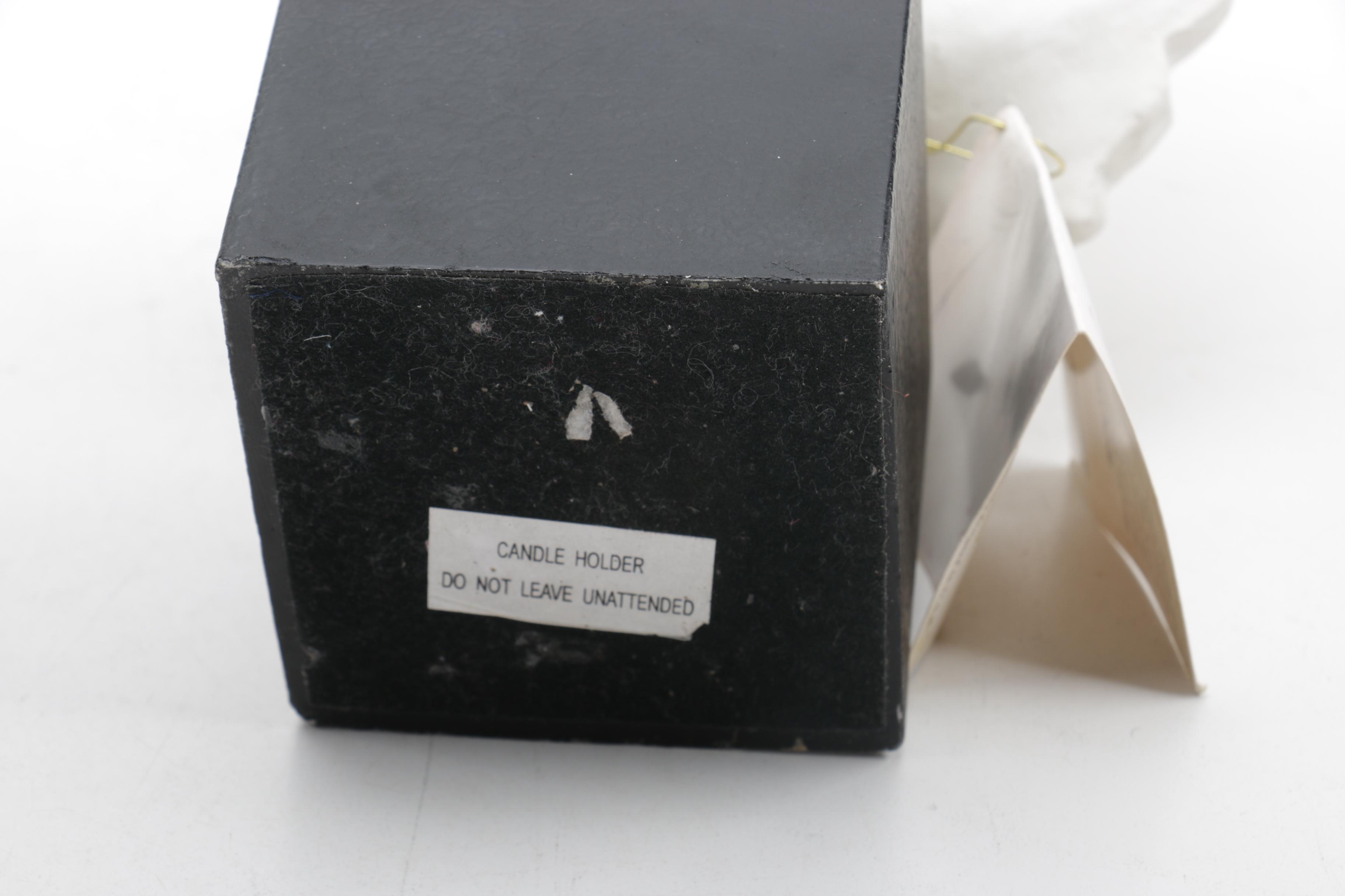 TMS Vitruvian "Blowing A Kiss" Resin Candleholder