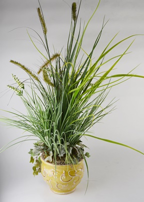 Four Faux Plants With Red Amaryllis