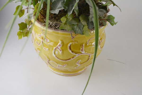 Four Faux Plants With Red Amaryllis