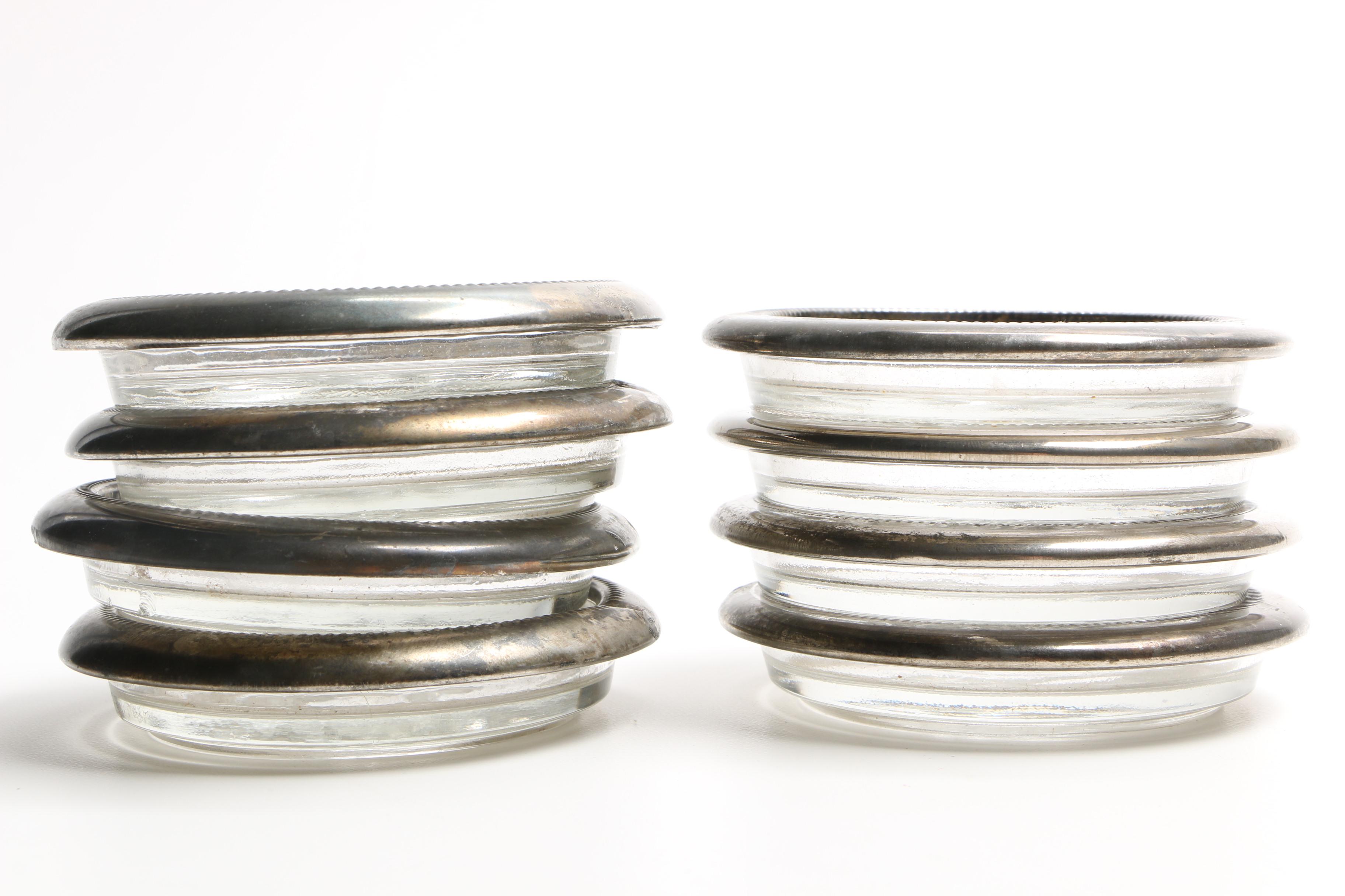 Two Sets of Sterling Rimmed Glass Coasters