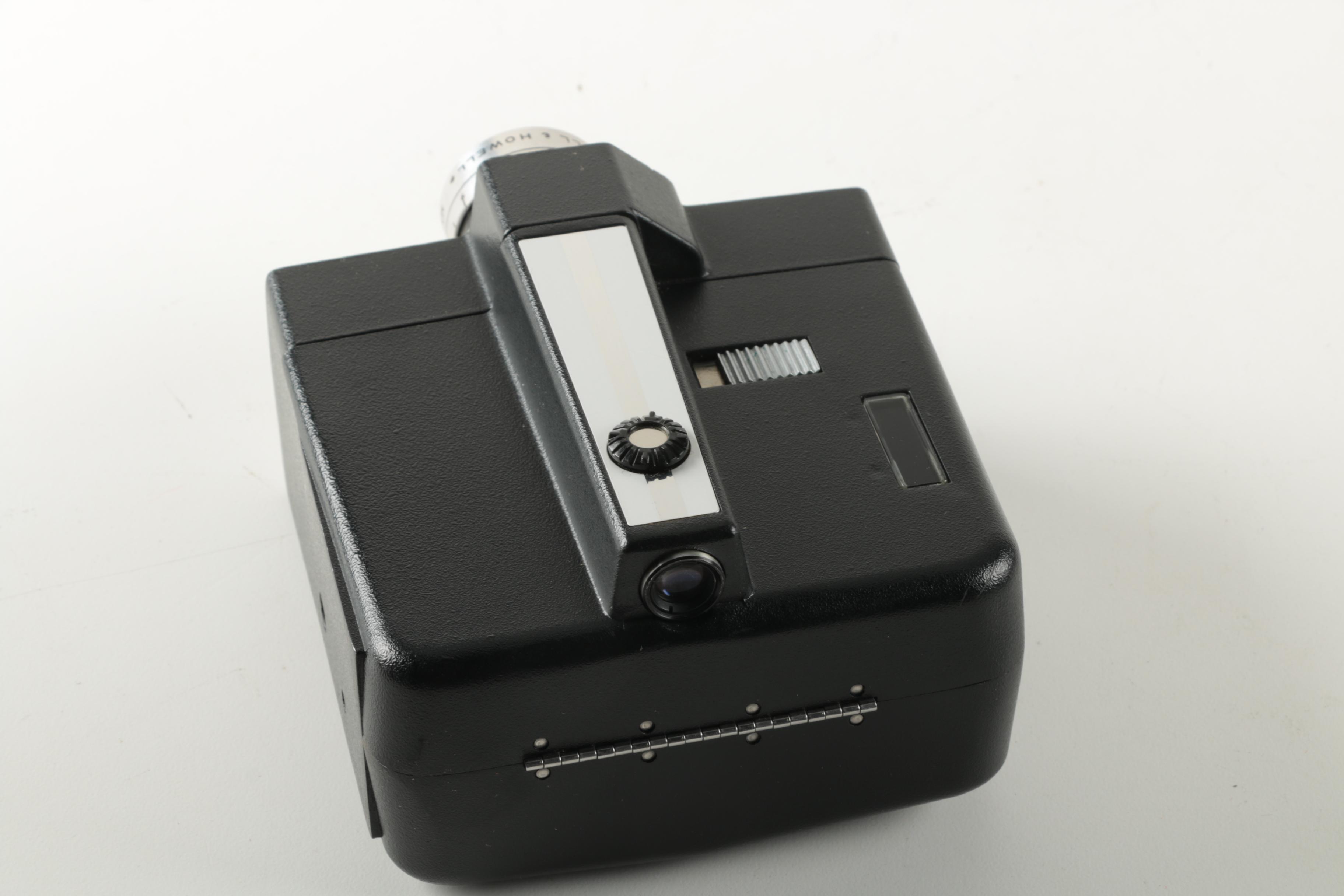 Pair of Vintage Bell & Howell Cameras with Cases