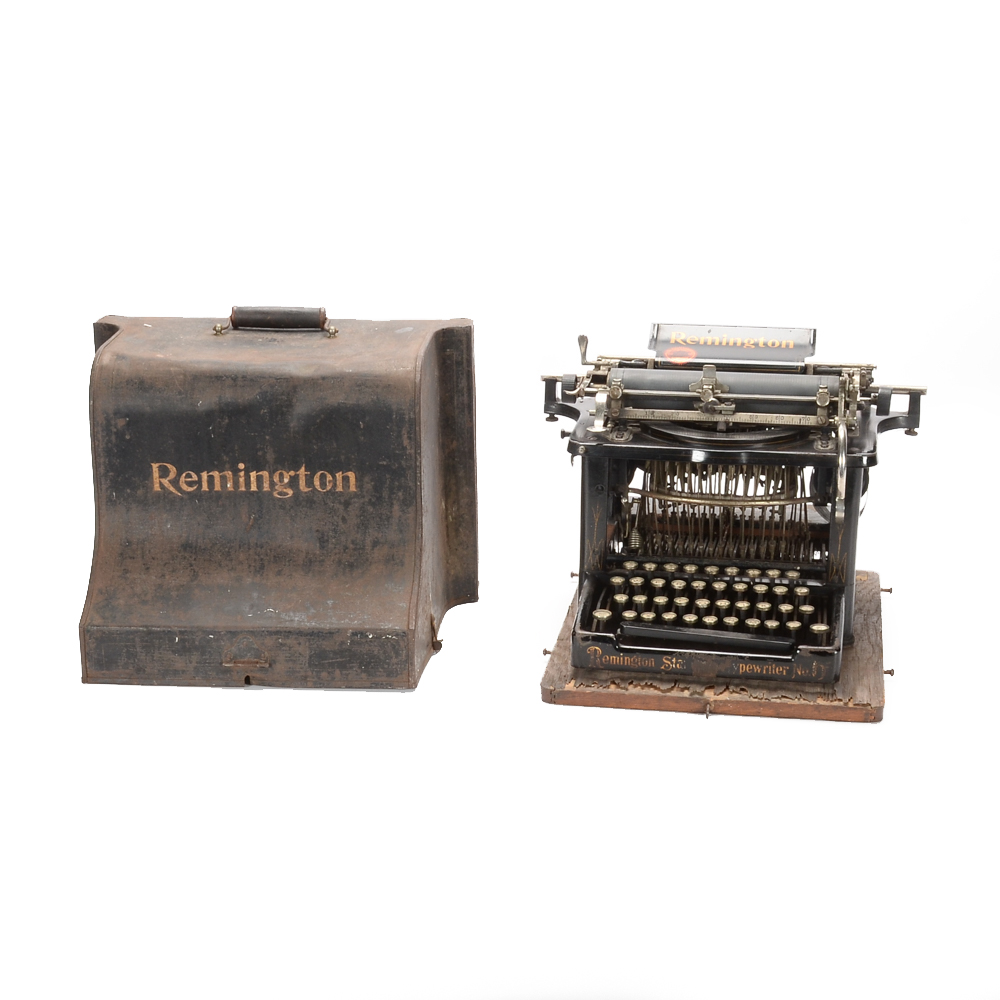 Antique Remington Typewriter and Metal Cover