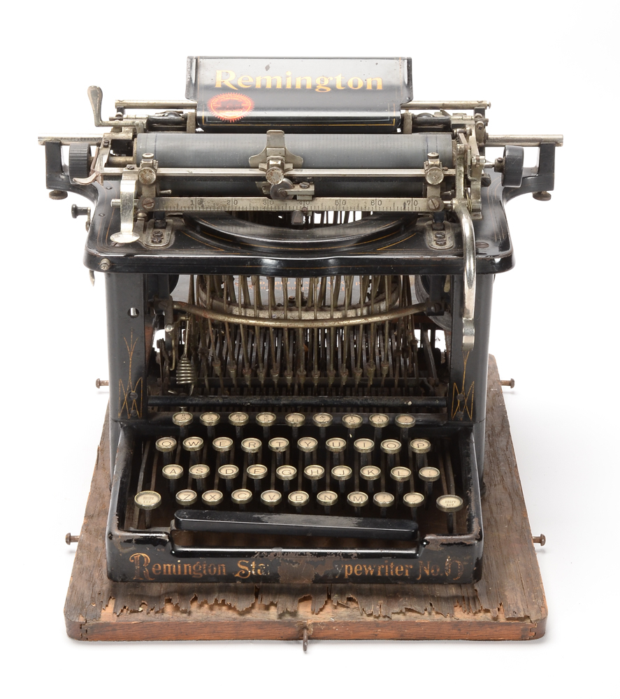 Antique Remington Typewriter and Metal Cover