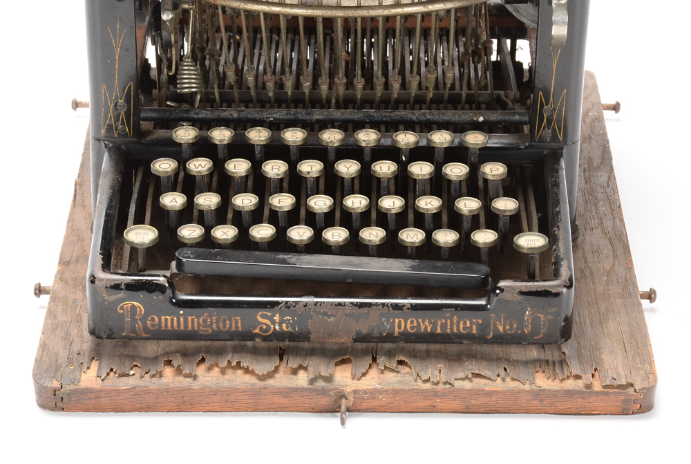 Antique Remington Typewriter and Metal Cover